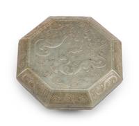 A Chinese Carved Jadeite Octagonal Box and Cover