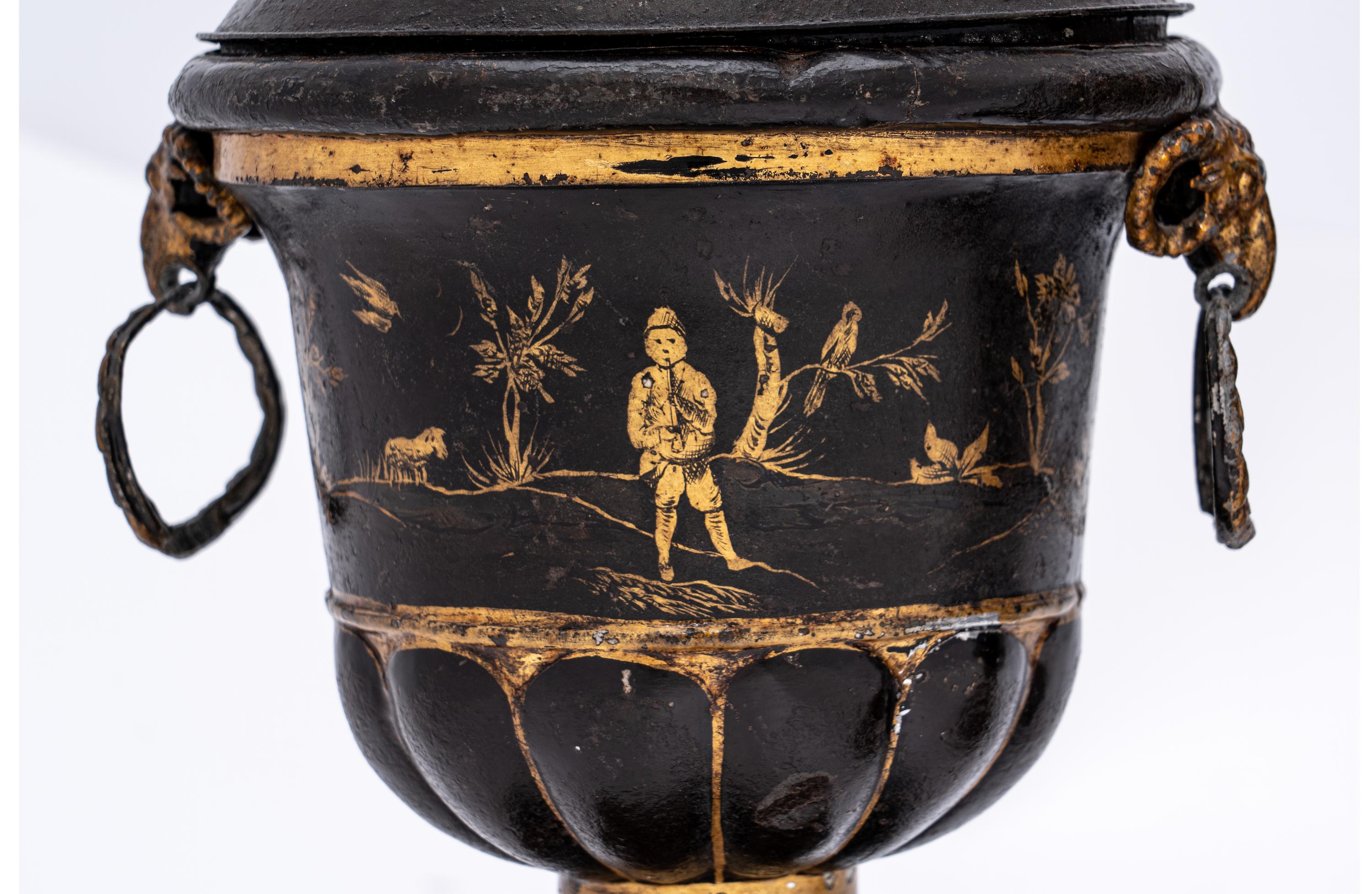 A Pair of Late George III Painted Tôle Urns