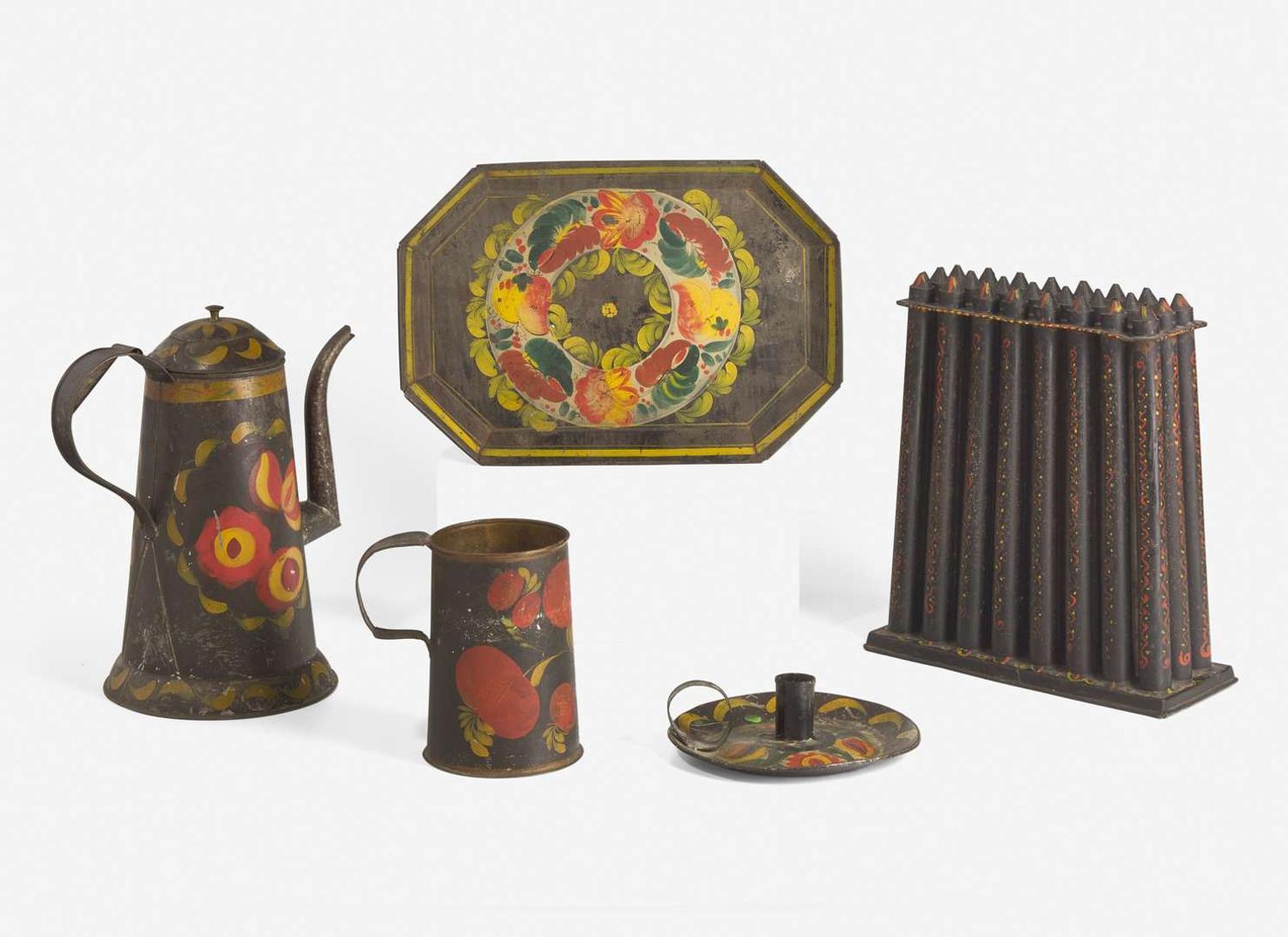 A group of five tole or painted and decorated tinware table items, probably Pennsylvania, 19th / 20th century
