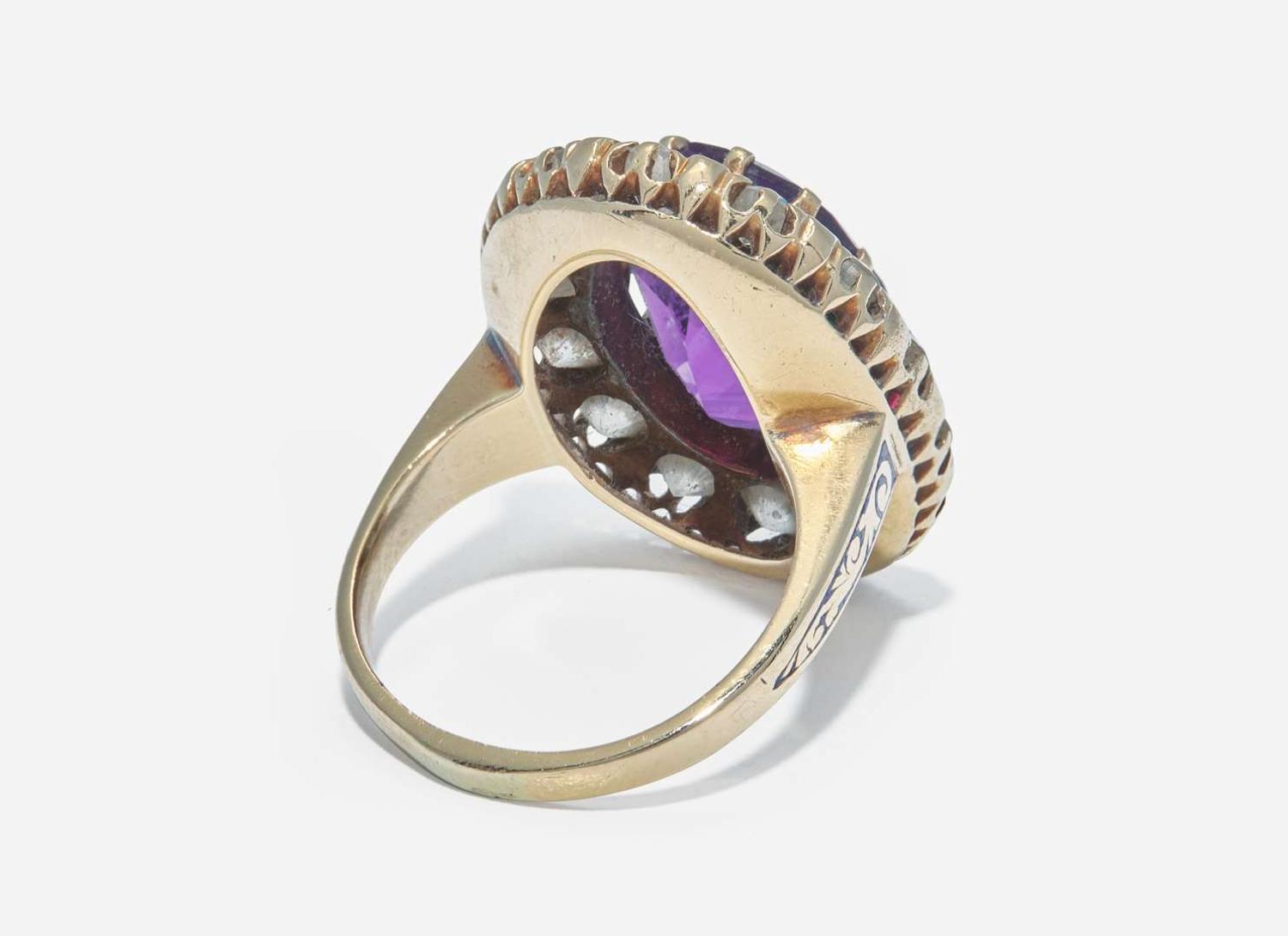 A 10K Yellow Gold, Amethyst, and Diamond Ring