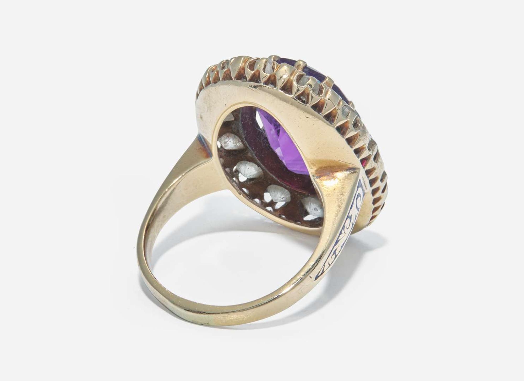 A 10K Yellow Gold, Amethyst, and Diamond Ring