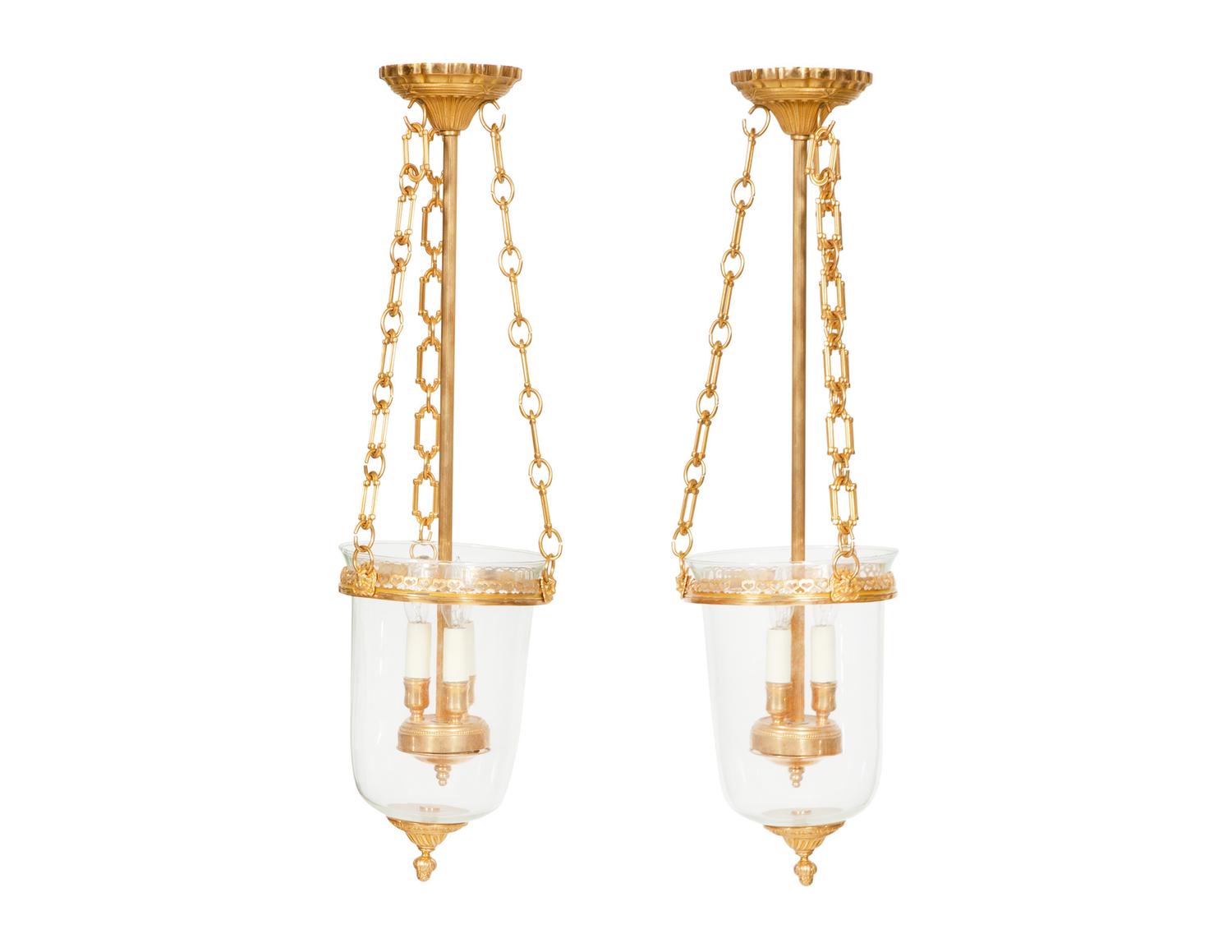 A Pair of French Gilt Metal and Glass Lanterns
