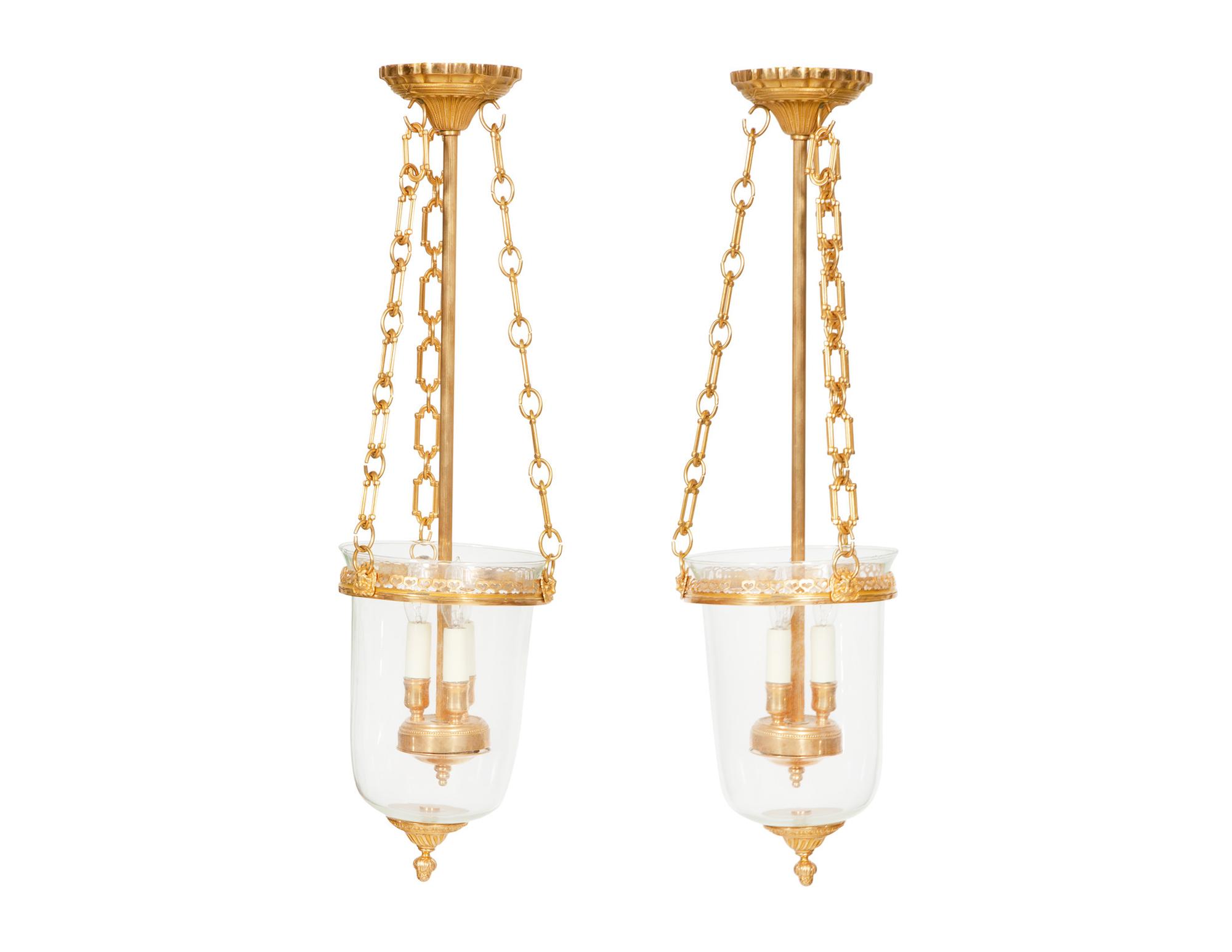 A Pair of French Gilt Metal and Glass Lanterns