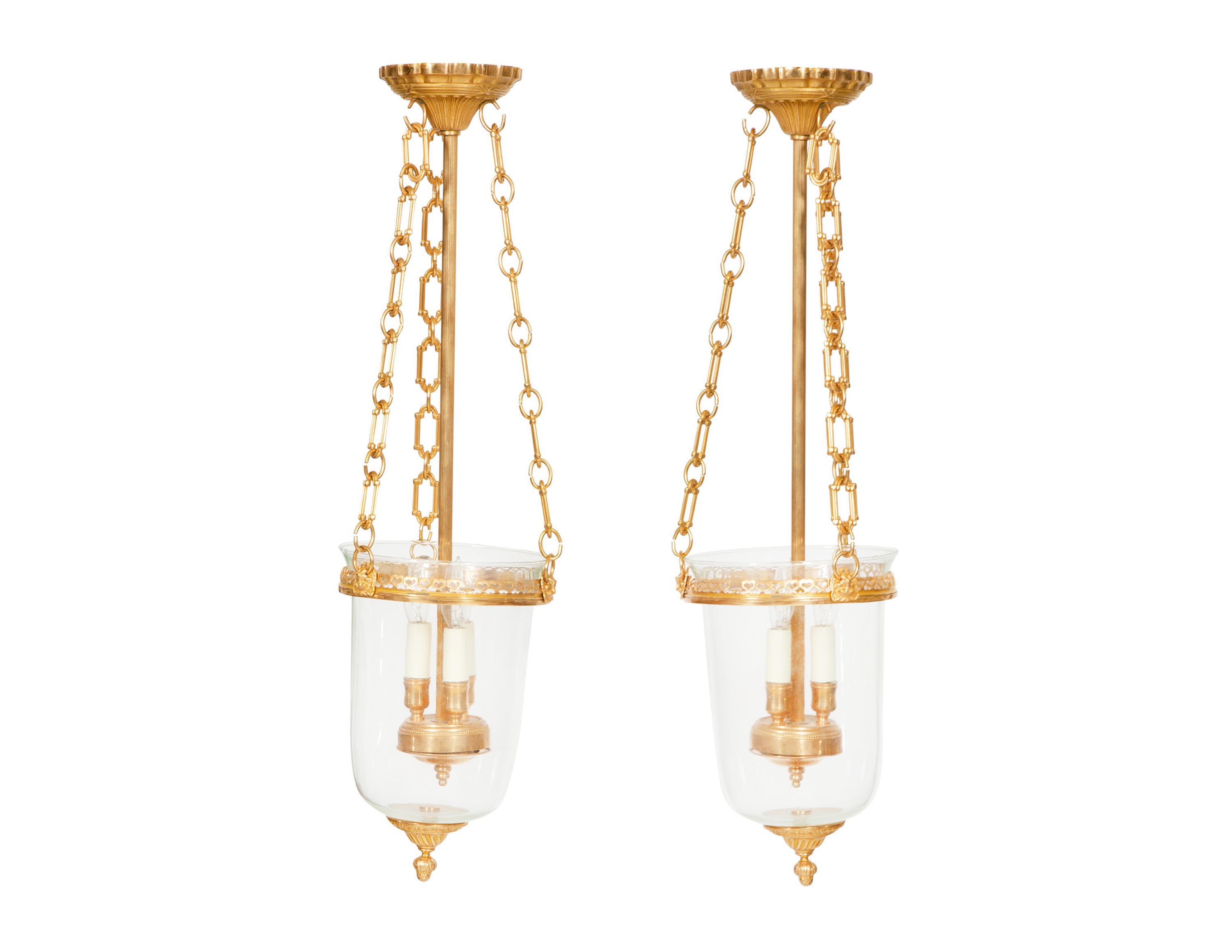 A Pair of French Gilt Metal and Glass Lanterns