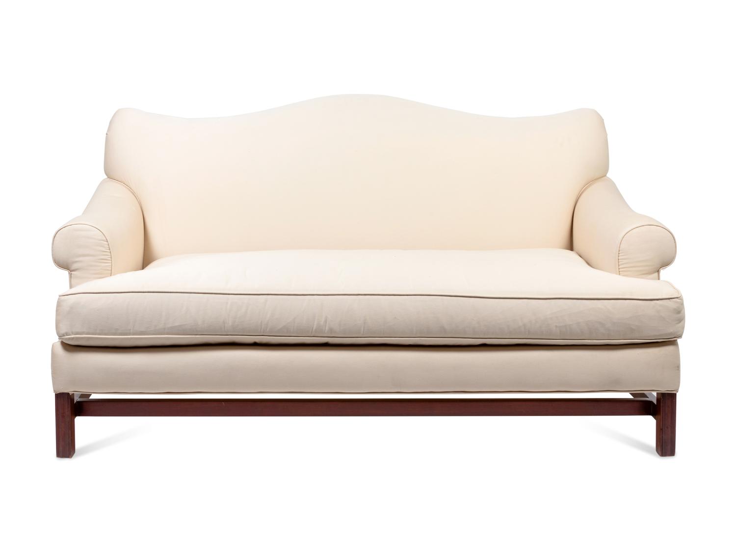 A Chippendale Style Camelback Sofa