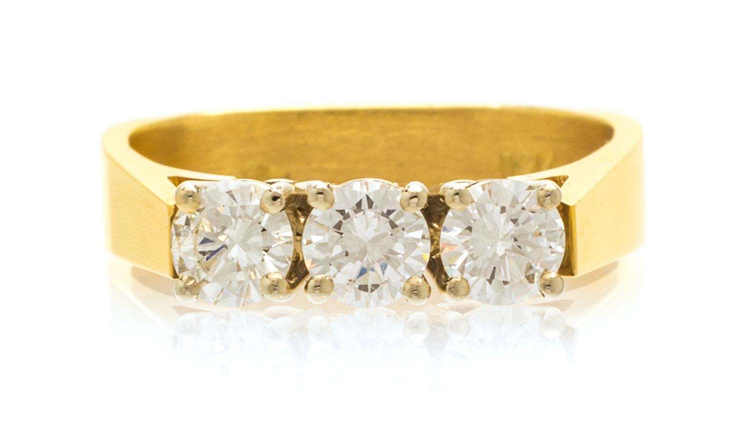 An 18 Karat Yellow Gold and Diamond Ring, 3.10 dwts.