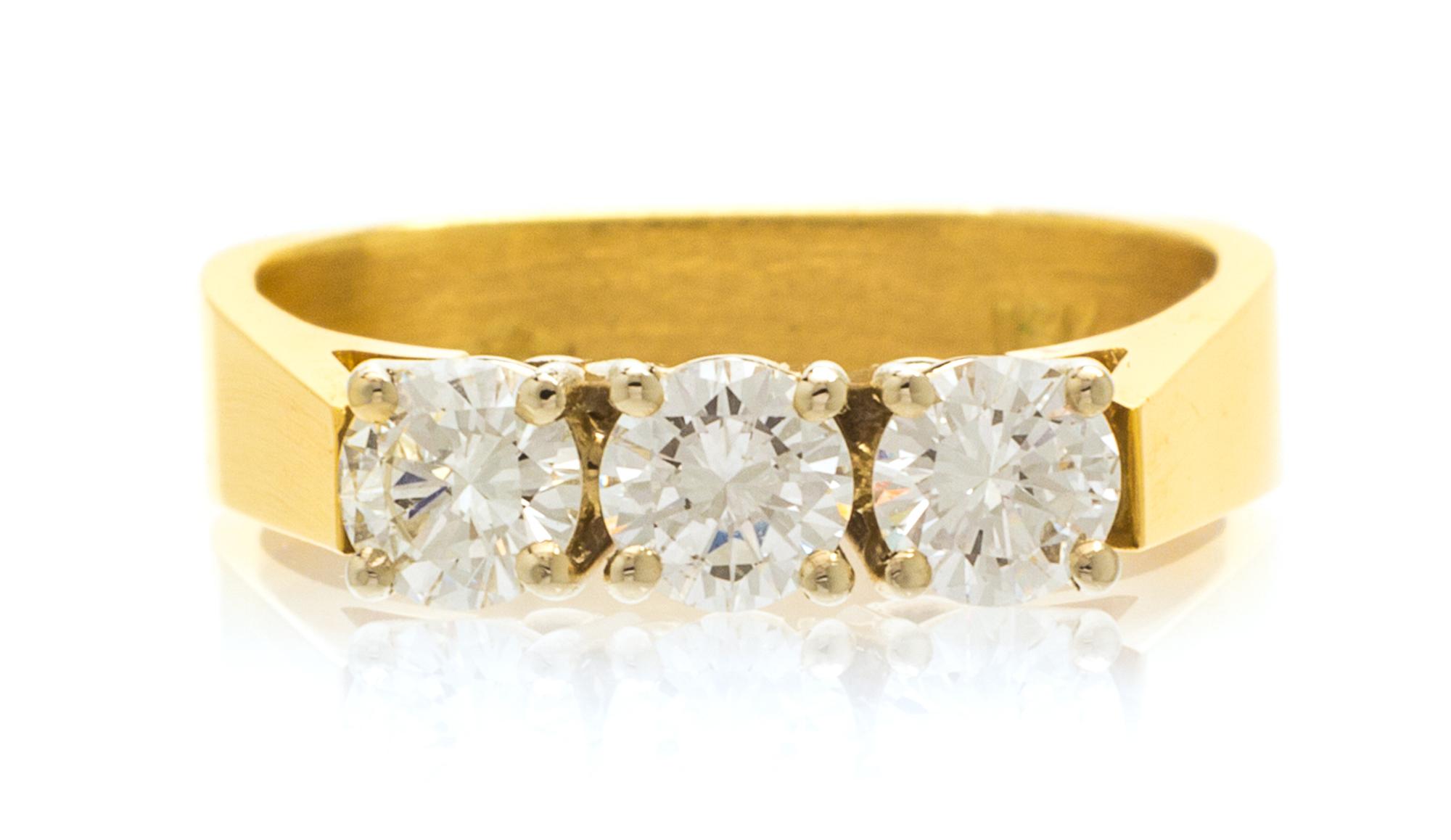 An 18 Karat Yellow Gold and Diamond Ring, 3.10 dwts.