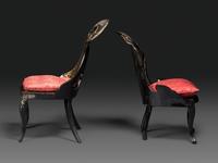 Two Victorian Black Lacquered Parcel-Gilt and Mother-of-Pearl Inlaid Cane Upholstered Slipper Chairs