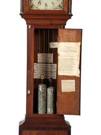 A Federal Carved and Inlaid, Brass-Mounted Mahogany Tall Case Clock