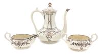 A Belleek Willets Porcelain Silver Overlay Coffee Service Height of coffee pot 6 1/2 inches.