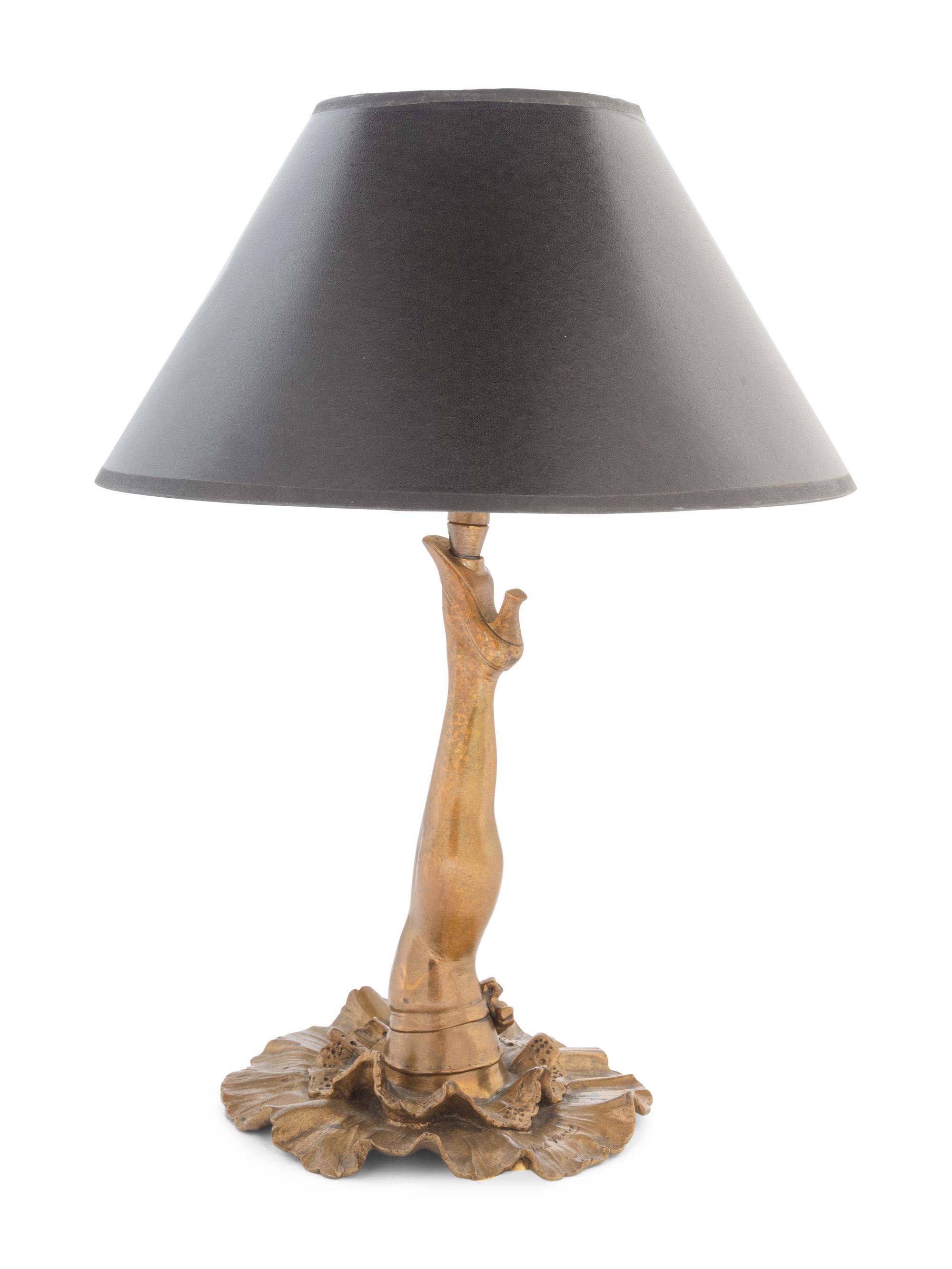 A Whimsical Gilt Metal "Cabaret Leg" Table Lamp