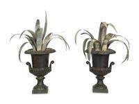 A Pair Cast Iron Urns with Tole Palm Topiaries
