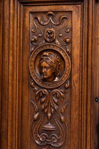 A French Renaissance Revival Carved Walnut Cabinet