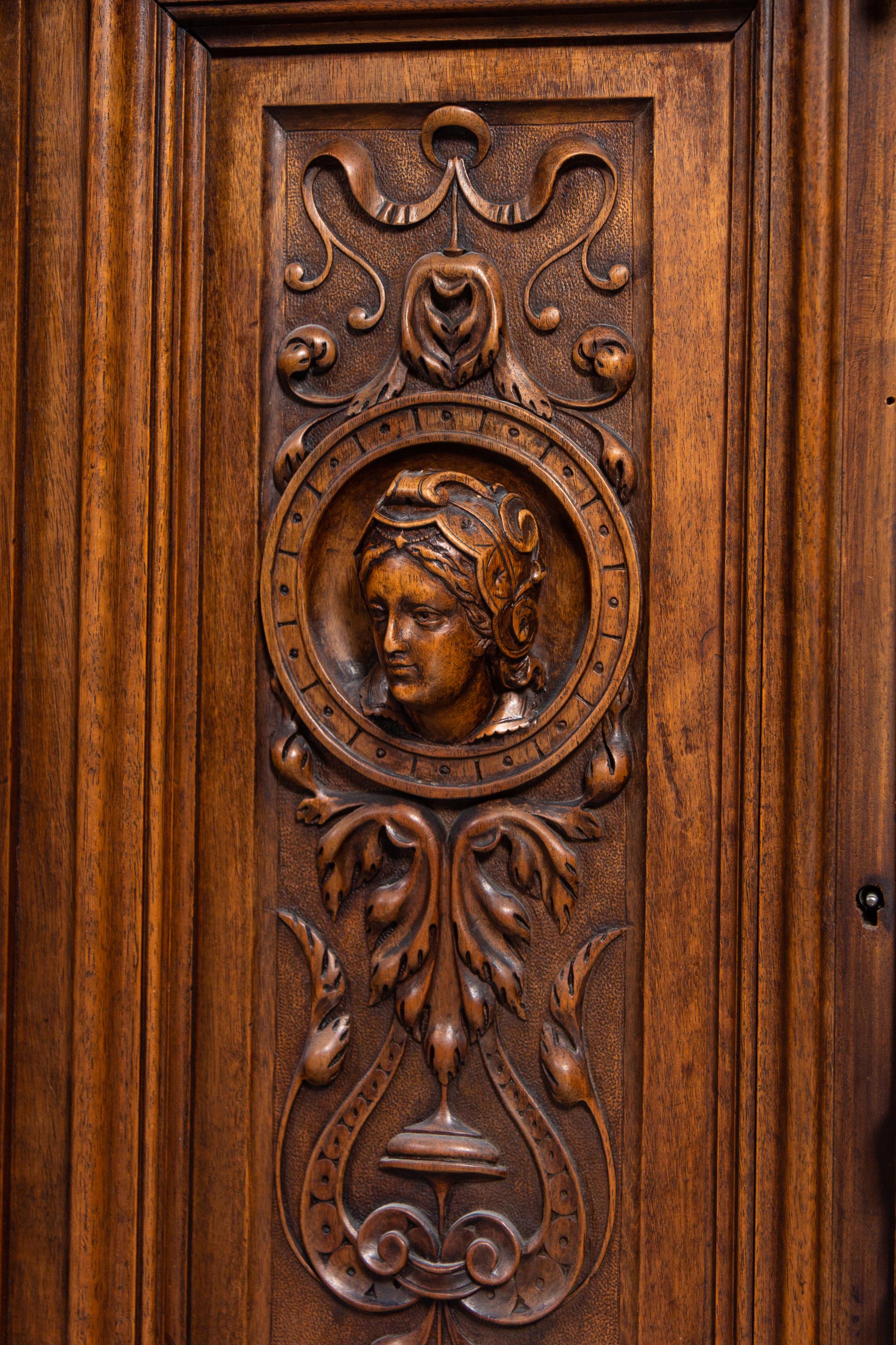 A French Renaissance Revival Carved Walnut Cabinet
