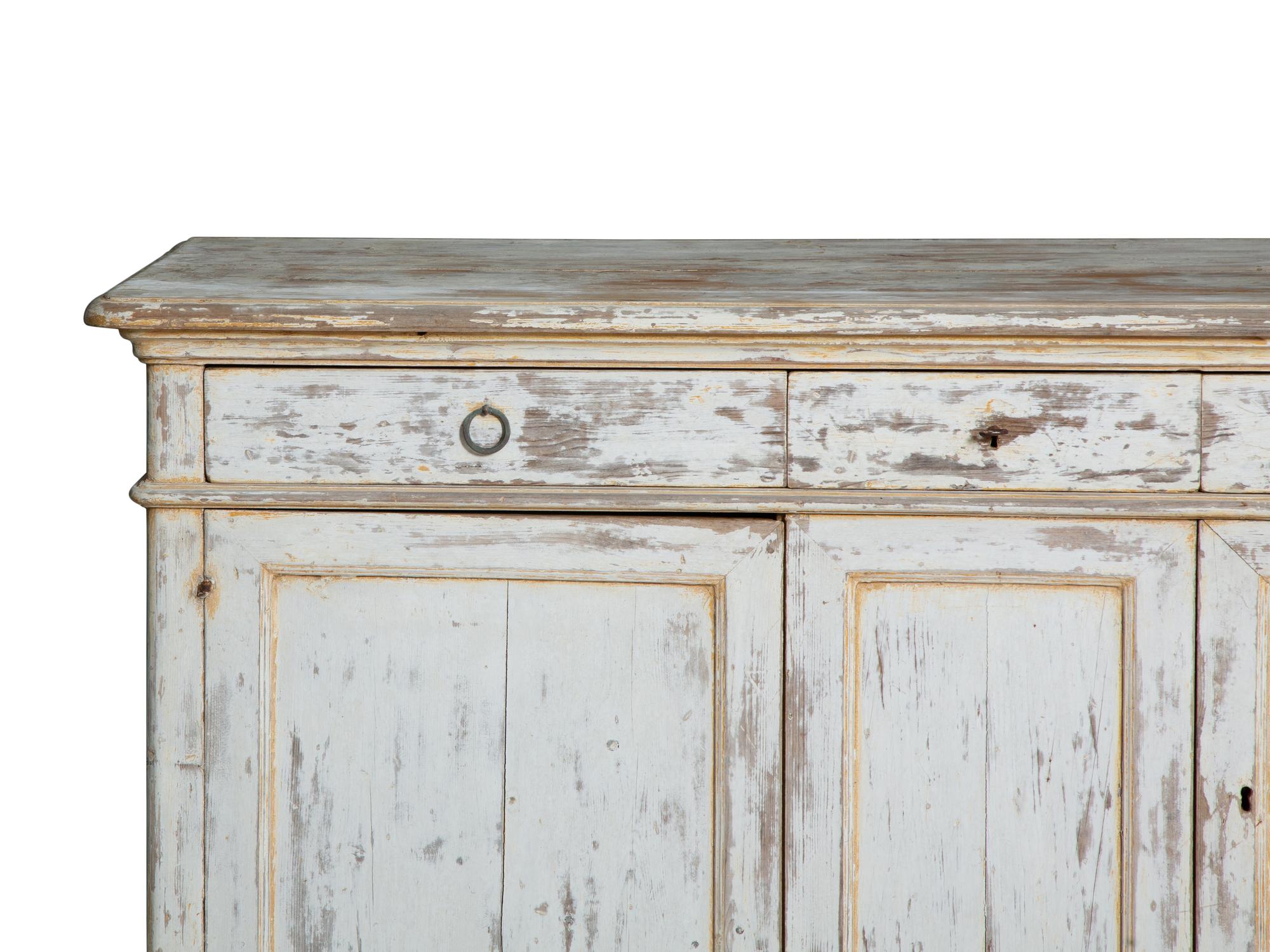 A French Provincial White-Painted Serving Cabinet
