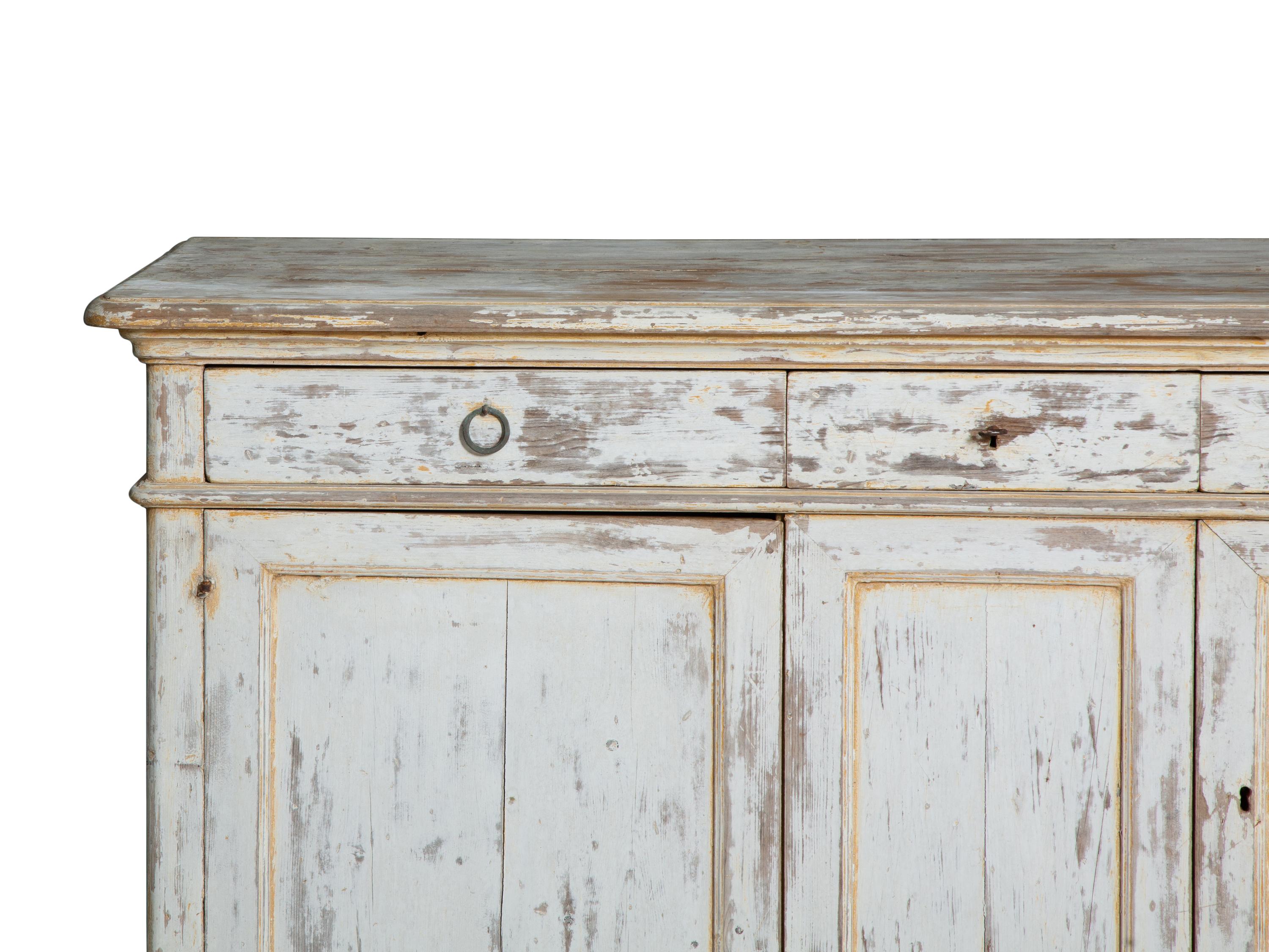 A French Provincial White-Painted Serving Cabinet