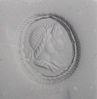 A Neoclassical Sardonyx Cameo and Gold Finger Ring with a Double Portrait