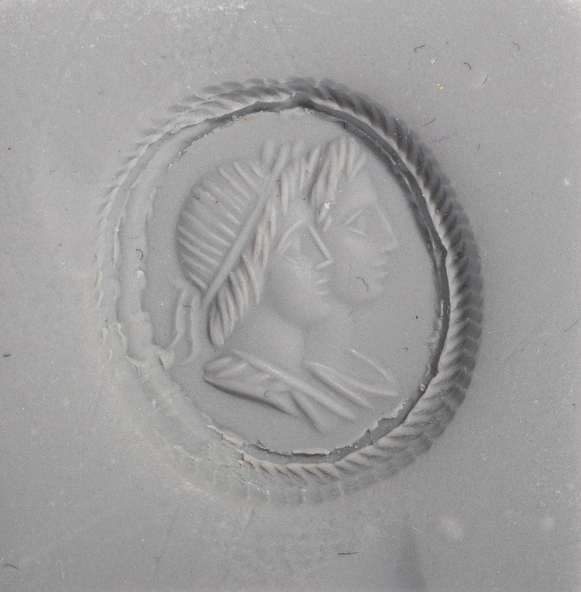 A Neoclassical Sardonyx Cameo and Gold Finger Ring with a Double Portrait