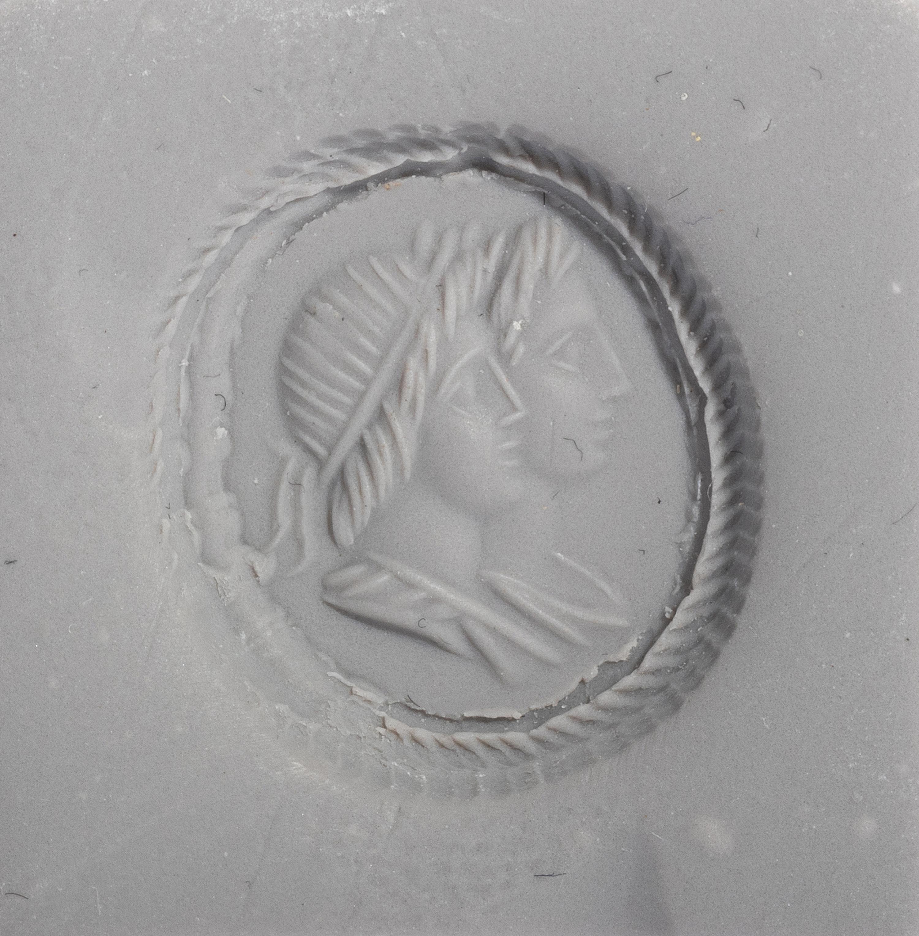 A Neoclassical Sardonyx Cameo and Gold Finger Ring with a Double Portrait