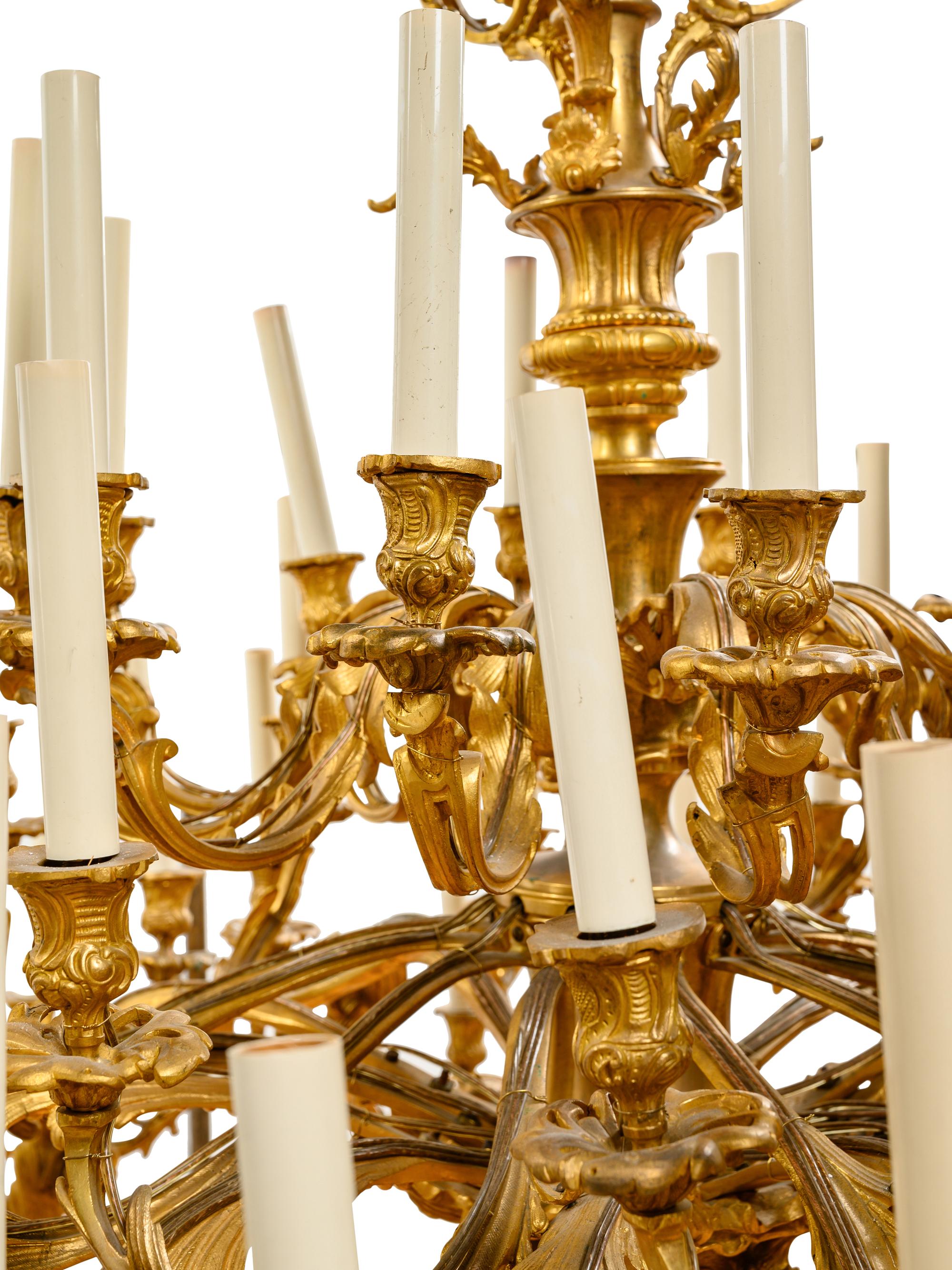 A Massive Louis XV Style Gilt Bronze Figural Sixty-Light Chandelier