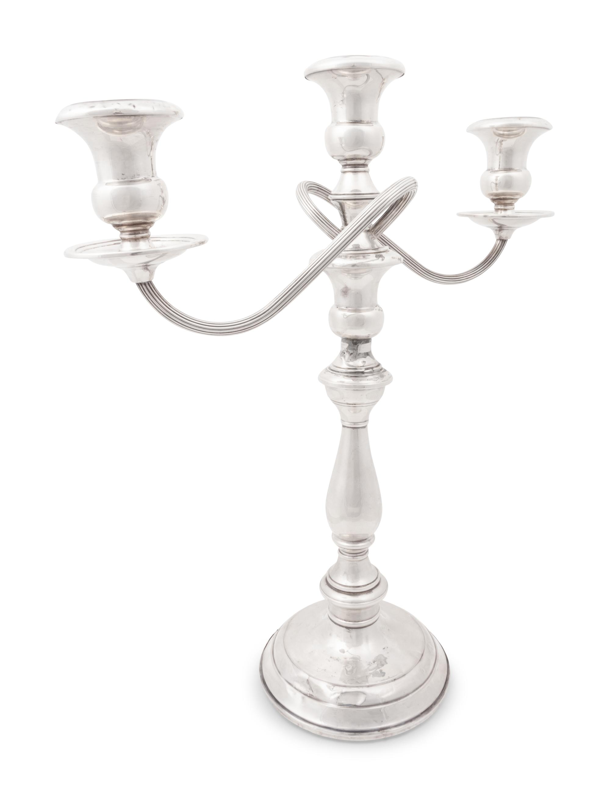 A Group of American Silver Candlesticks and Candelabras