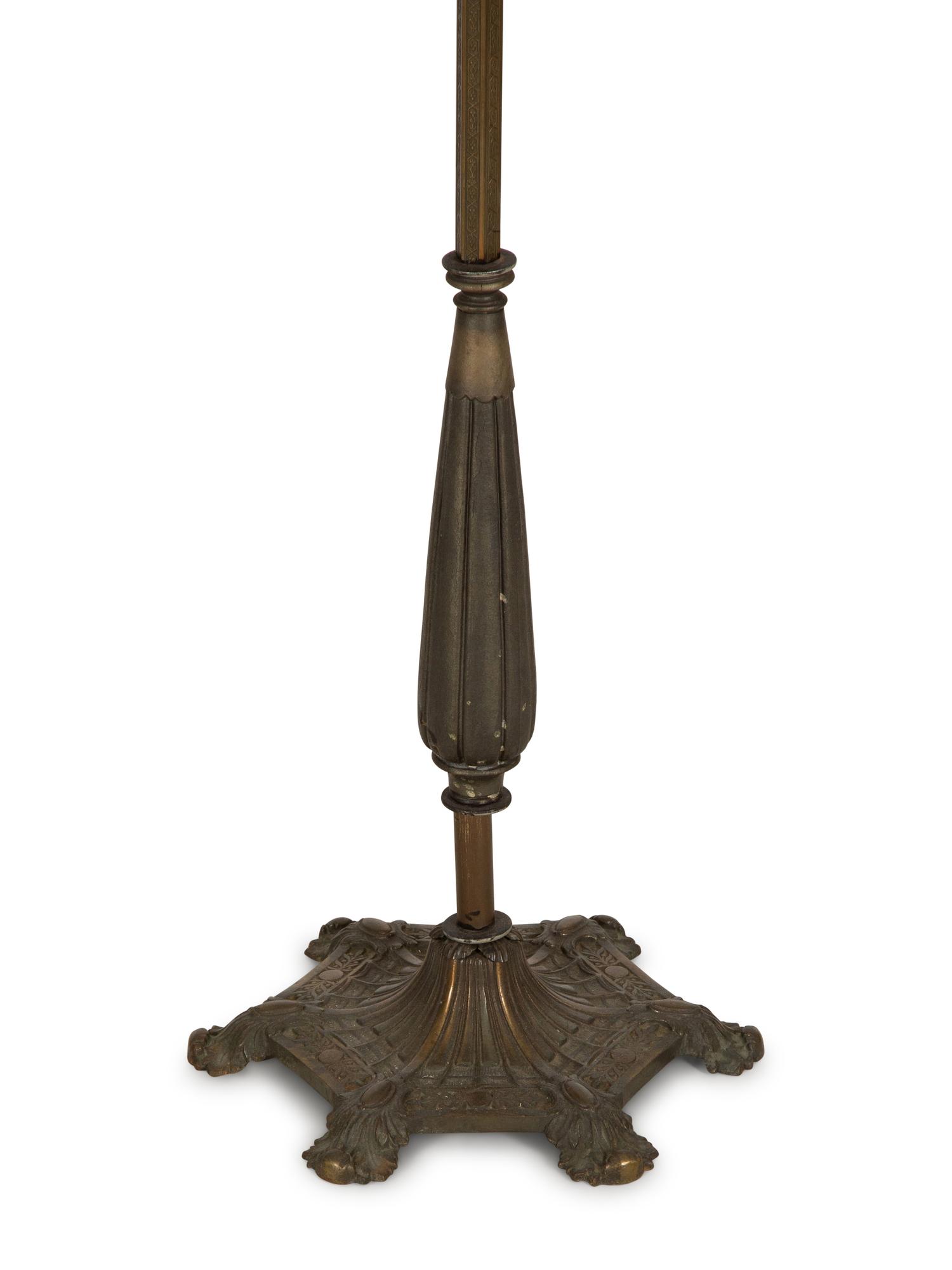 A Pair of Patinated Metal Lantern Style Floor Lamps