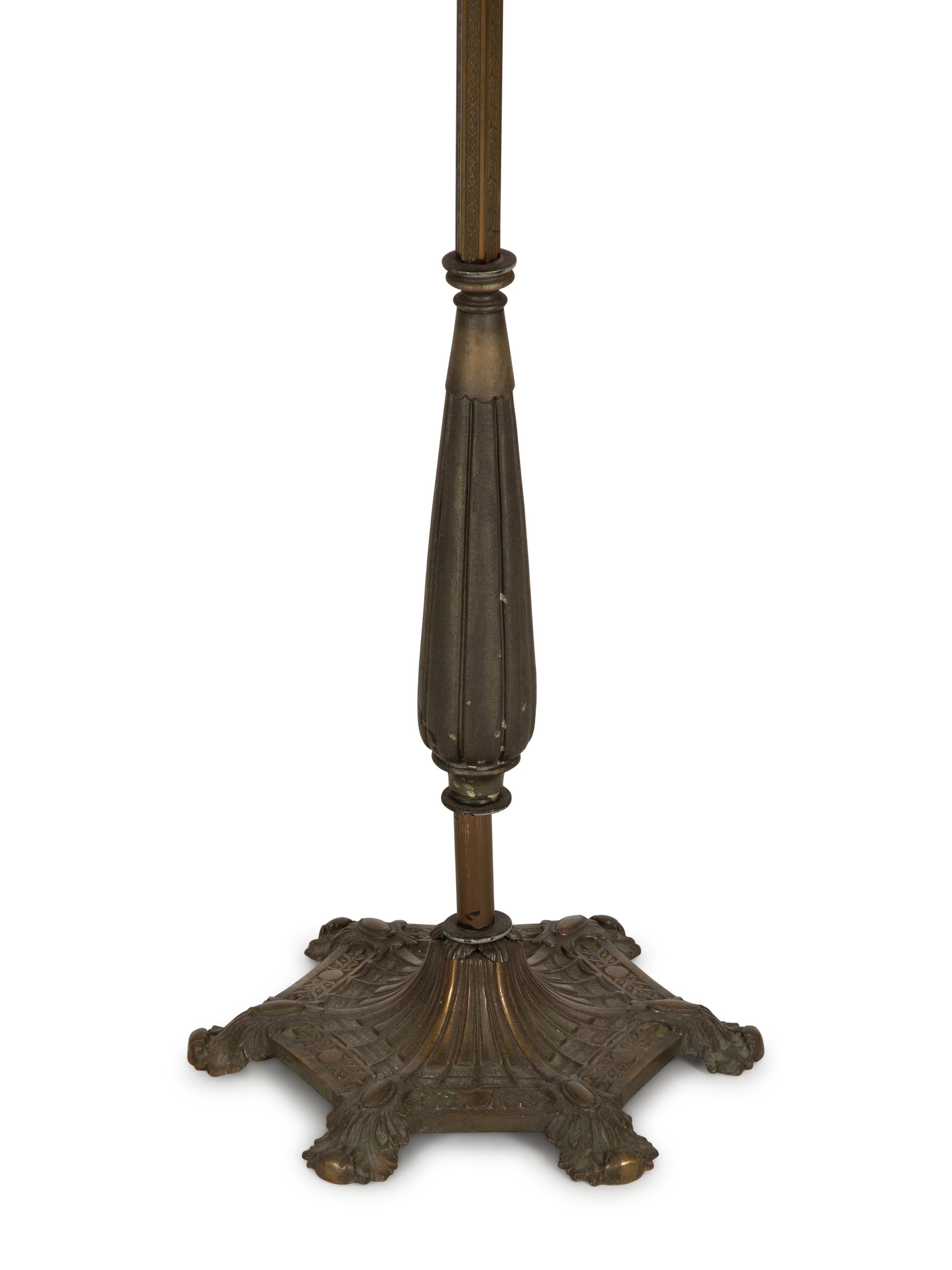 A Pair of Patinated Metal Lantern Style Floor Lamps