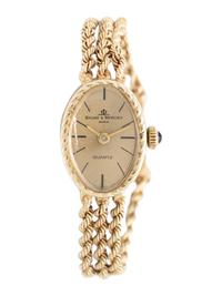 BAUME & MERCIER. 14K YELLOW GOLD WRISTWATCH