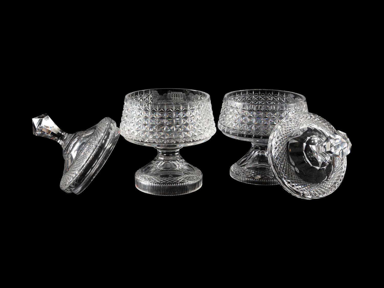A Near Pair of Cut and Etched Glass Commemorative Covered Urns