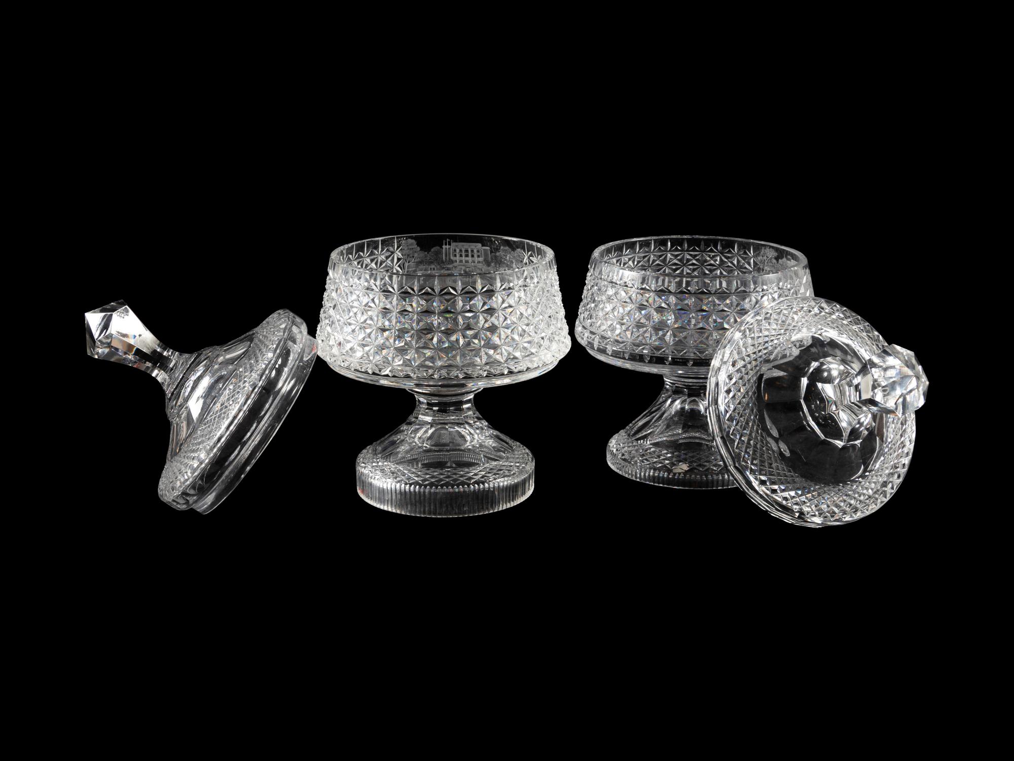 A Near Pair of Cut and Etched Glass Commemorative Covered Urns