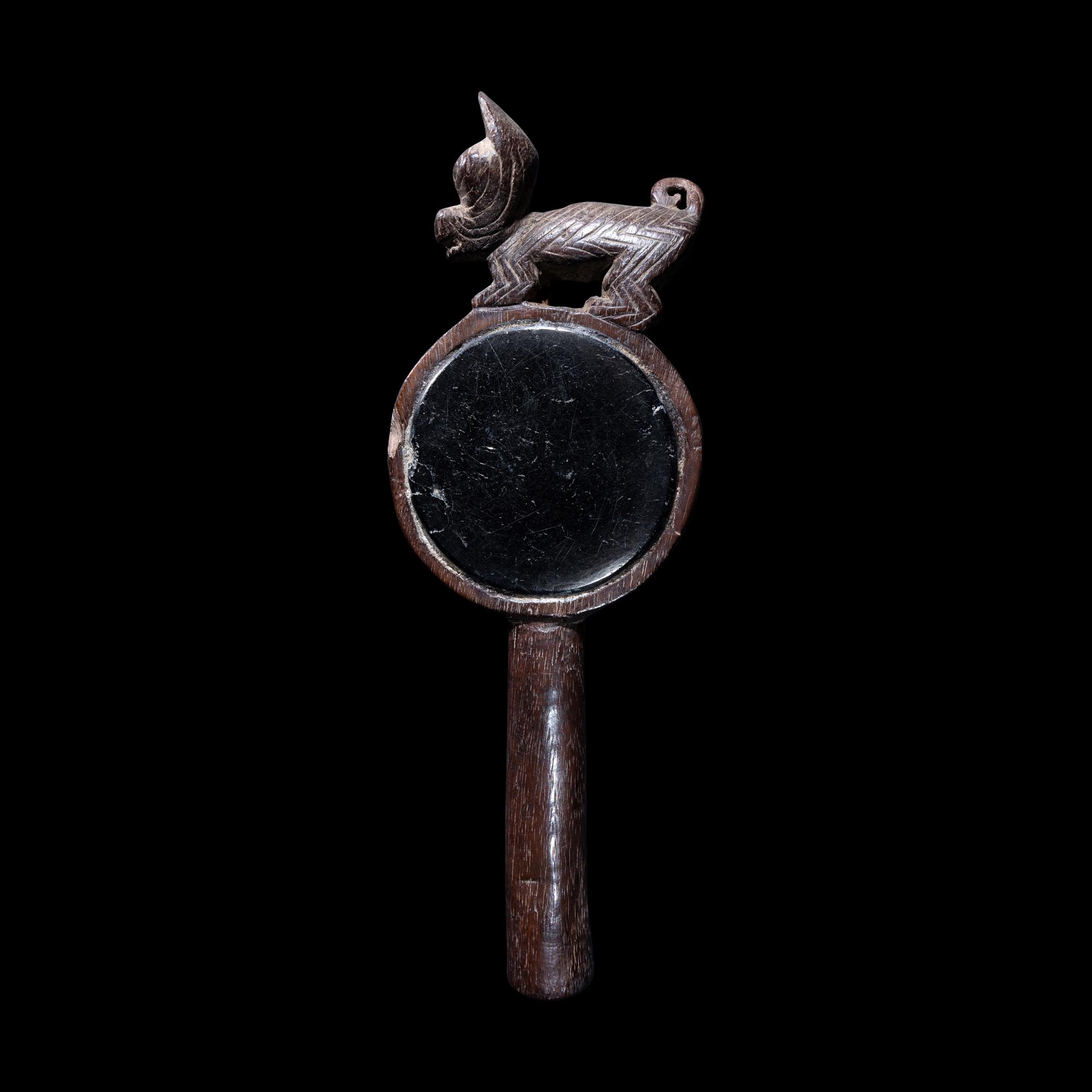 A Chancay Wood and Anthracite Mirror