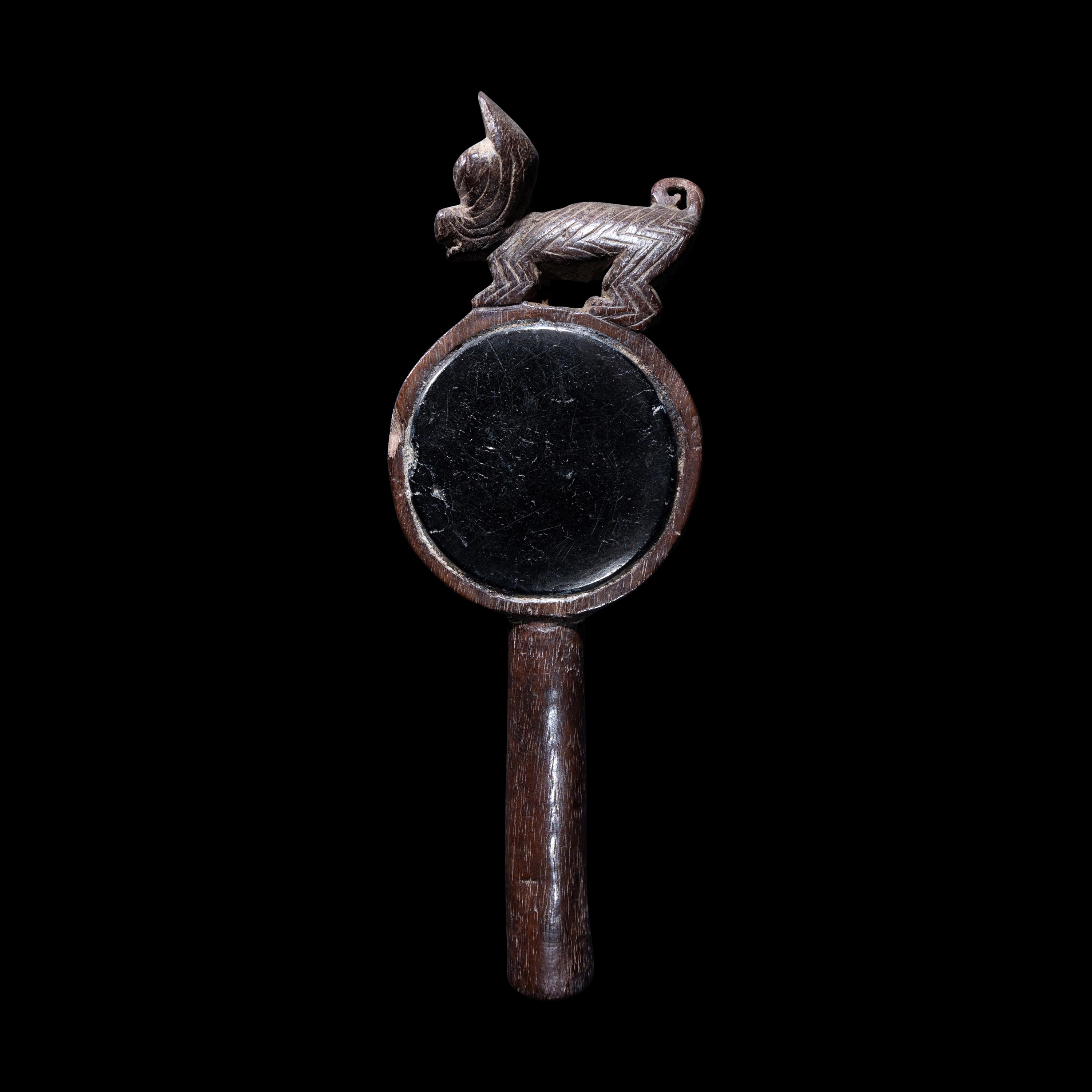 A Chancay Wood and Anthracite Mirror