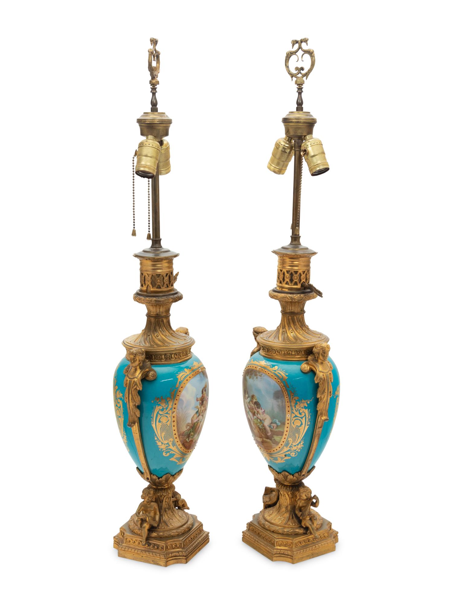 A Pair of Sèvres Style Gilt Bronze Mounted "Jeweled" Porcelain Fluid Lamps
