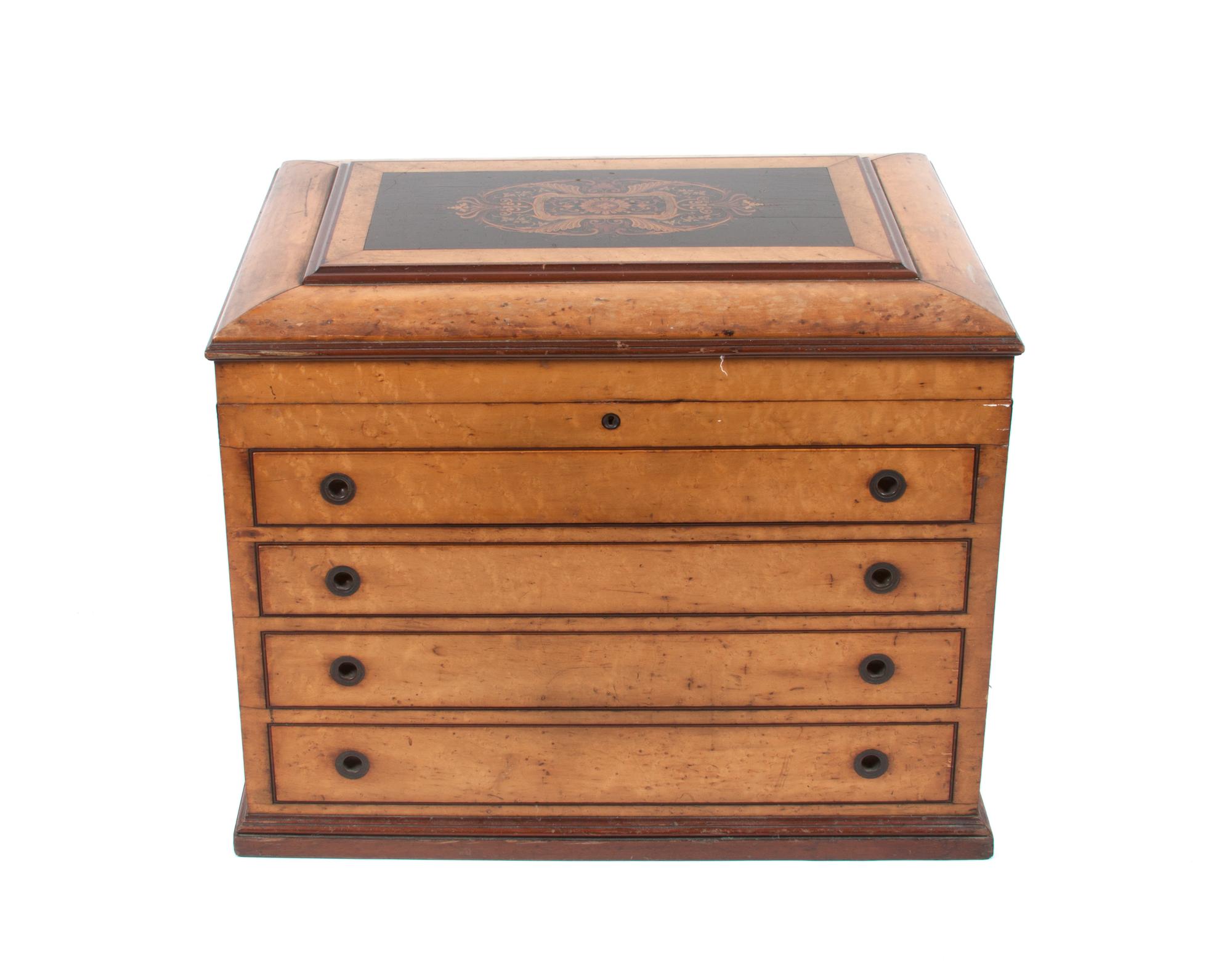 A Bird's-Eye Maple Flatware Chest Height 21 1/2 x width 28 1/2 x depth 19 1/4 inches.