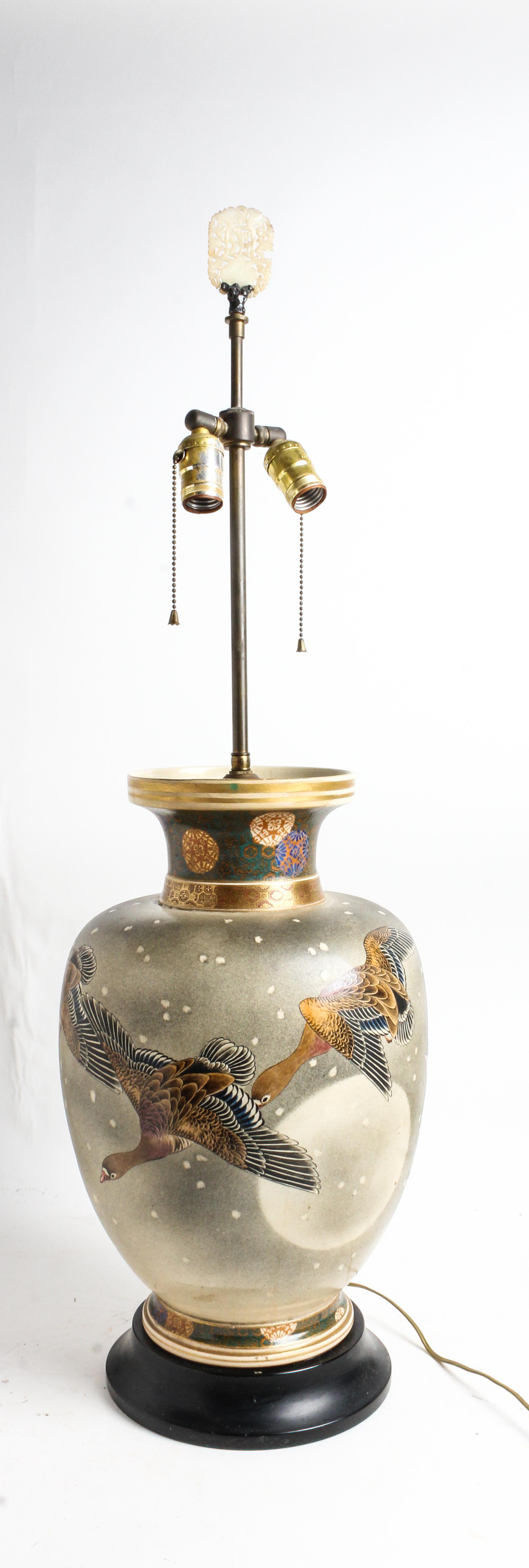 A Japanese Porcelain Vase Height overall 37 1/2 inches. — 20TH CENTURY