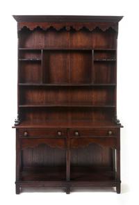 An Oak Welsh Dresser, Height 75 x width 47 1/2 x depth 13 1/2 inches.