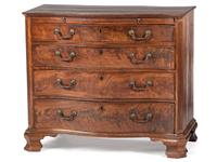 A George III Figured Mahogany Serpentine Front Bachelor's Chest