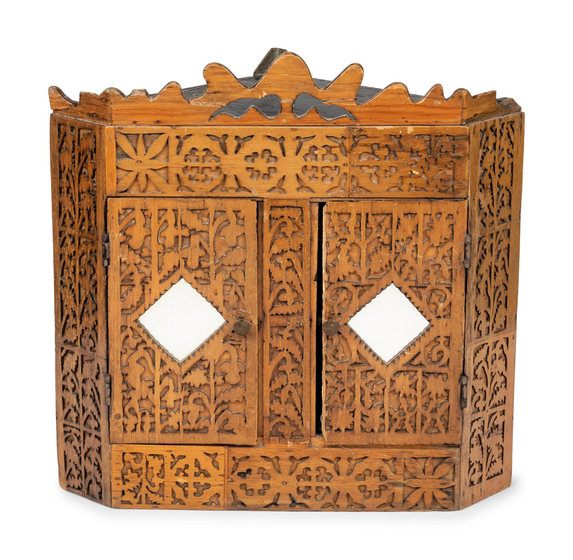 A Chip Carved Hanging Corner Cupboard
