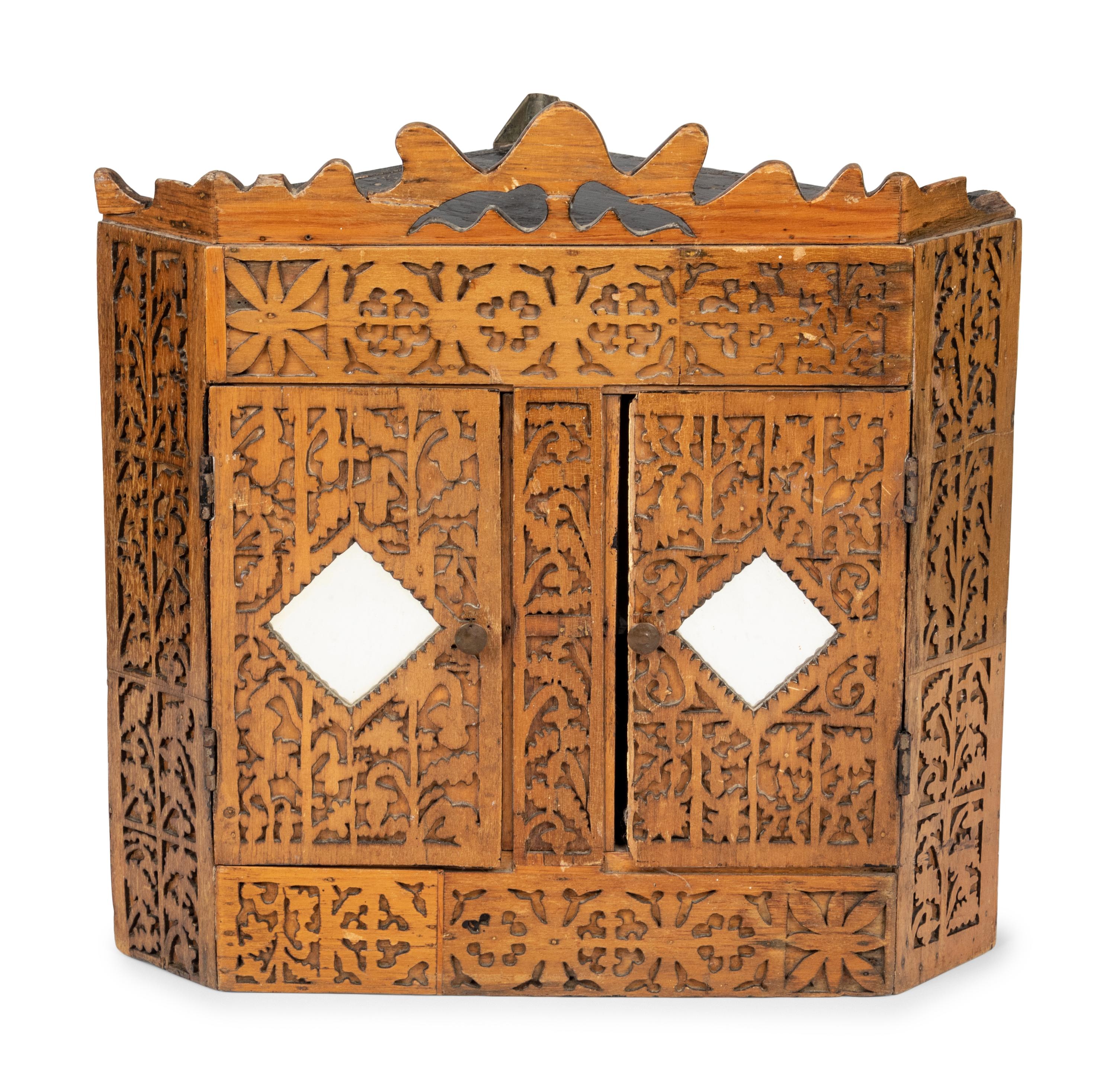 A Chip Carved Hanging Corner Cupboard