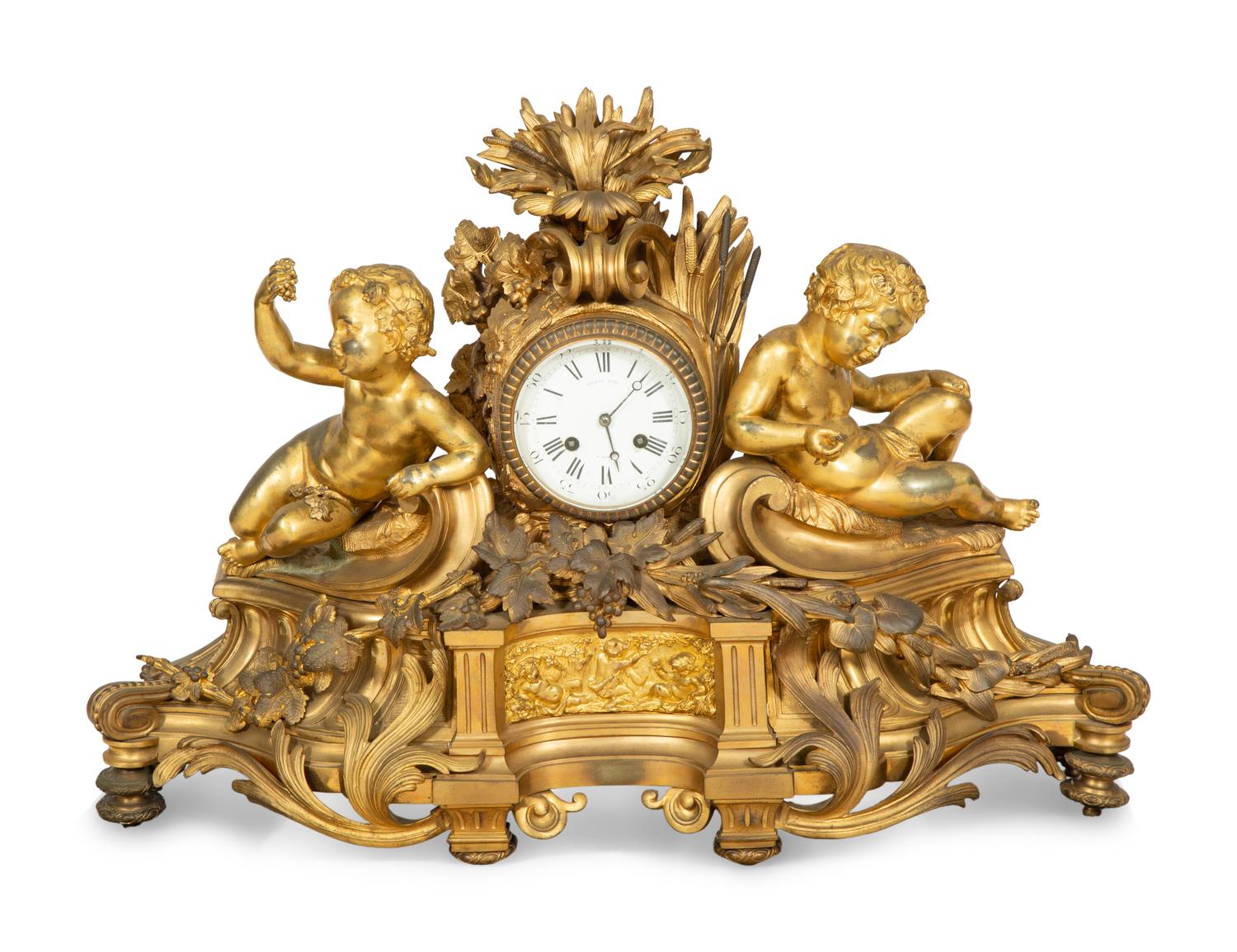 A Napoleon III Gilt Bronze Mantel Clock