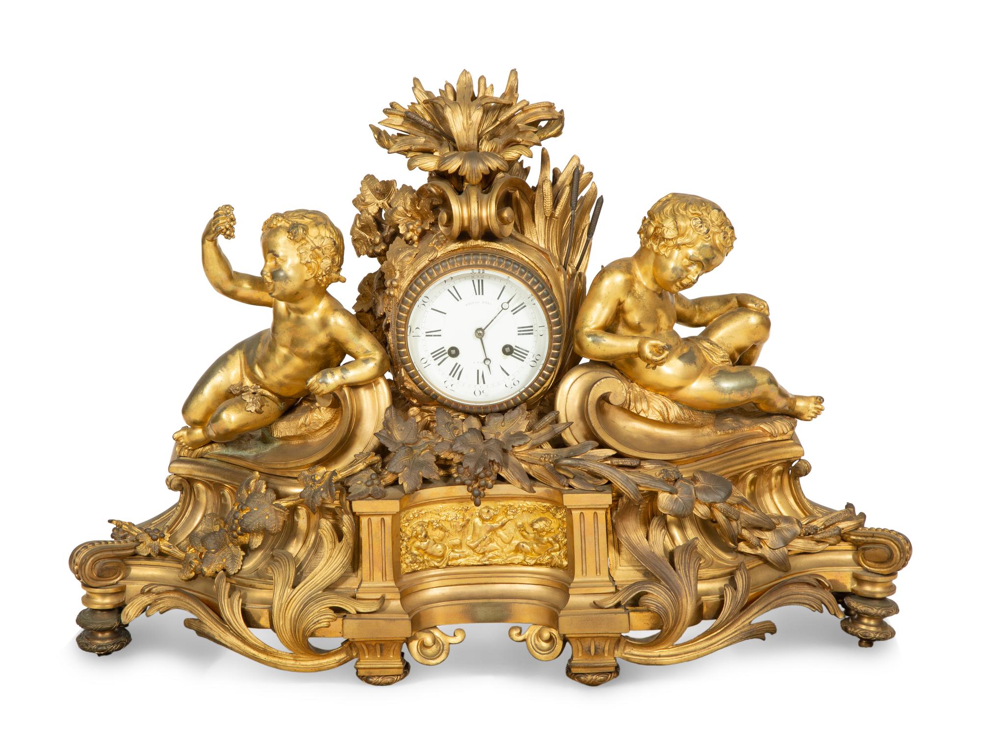 A Napoleon III Gilt Bronze Mantel Clock