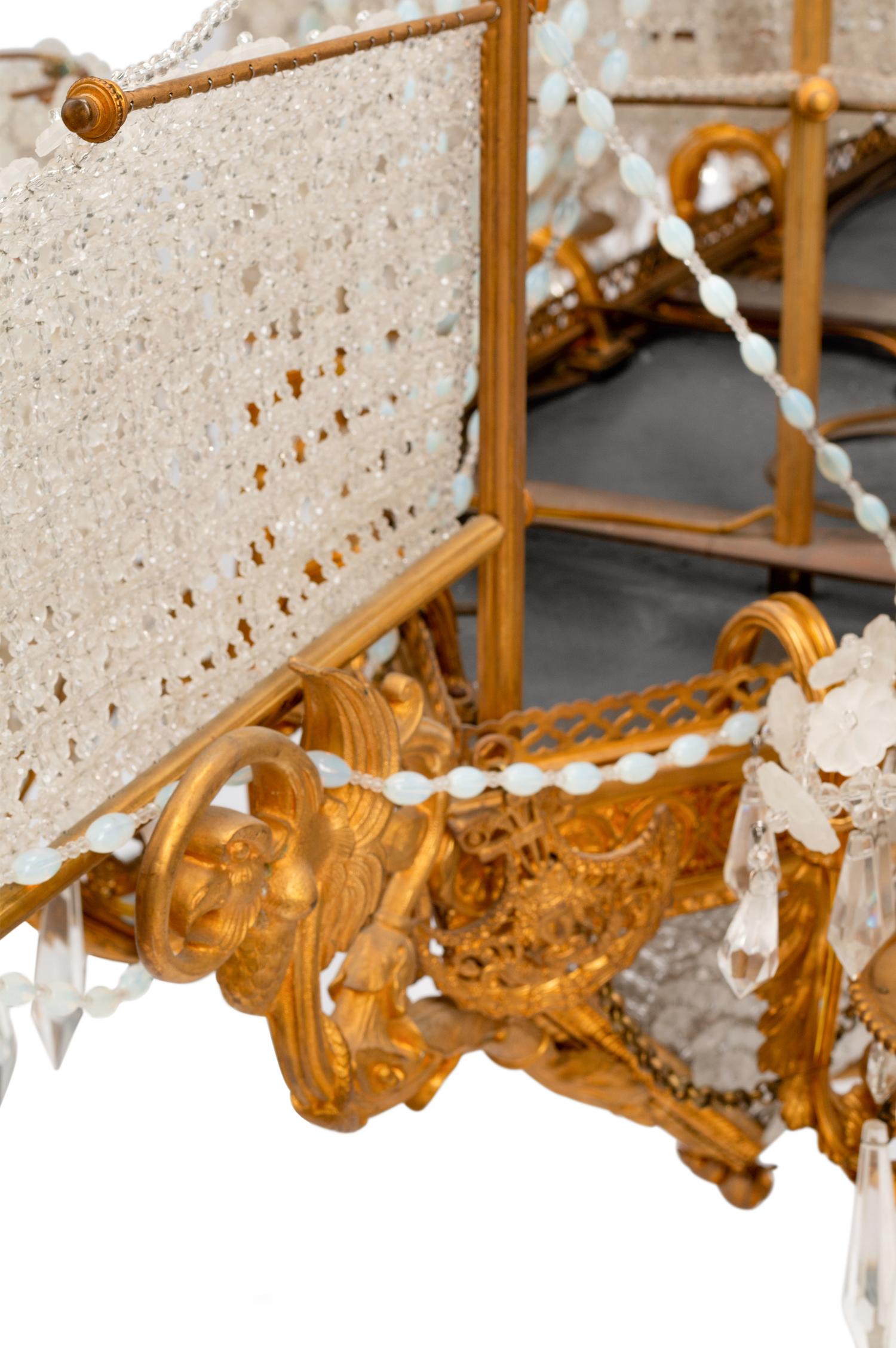 A Louis XVI Style Gilt Bronze and Cut Glass "Ship" Chandelier