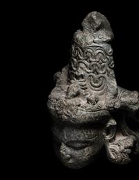 An Indian Carved Black Stone Head of a Vishnu