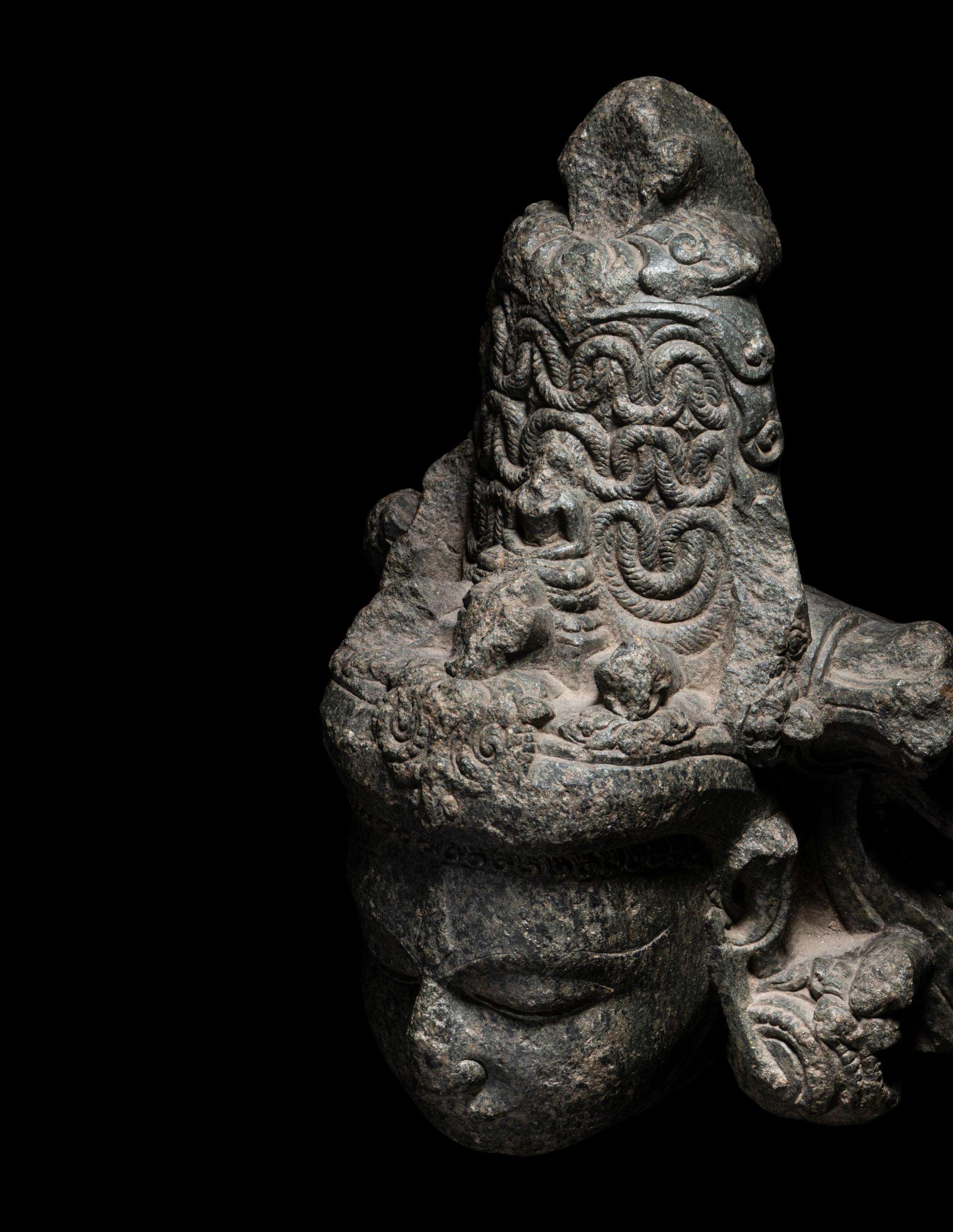 An Indian Carved Black Stone Head of a Vishnu