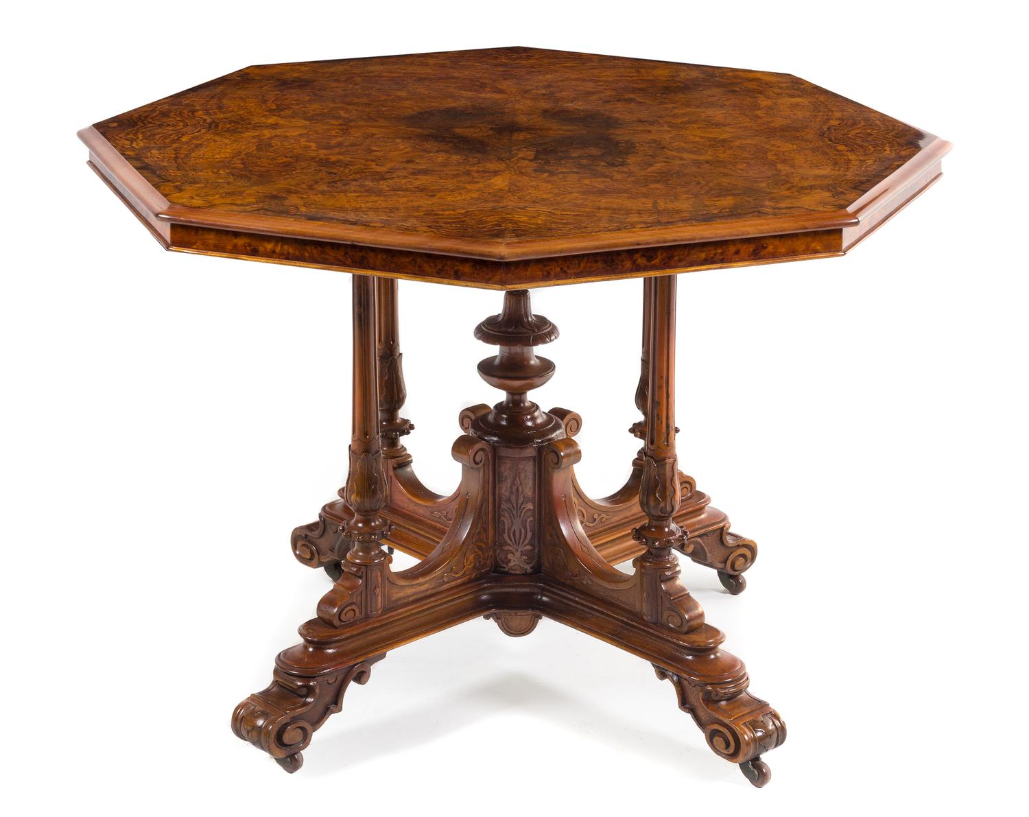 A Victorian Burlwood Center Table Height 28 1/2 x width 41 1/2 inches. — THIRD QUARTER 19TH CENTURY