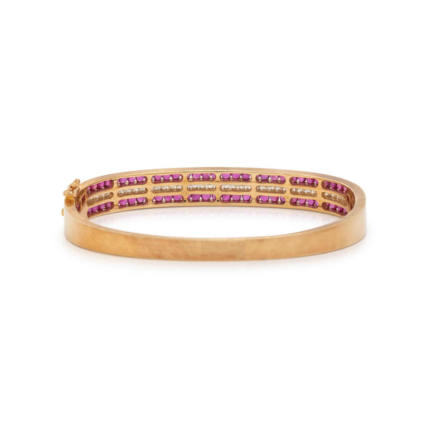 YELLOW GOLD, RUBY AND DIAMOND BANGLE BRACELET