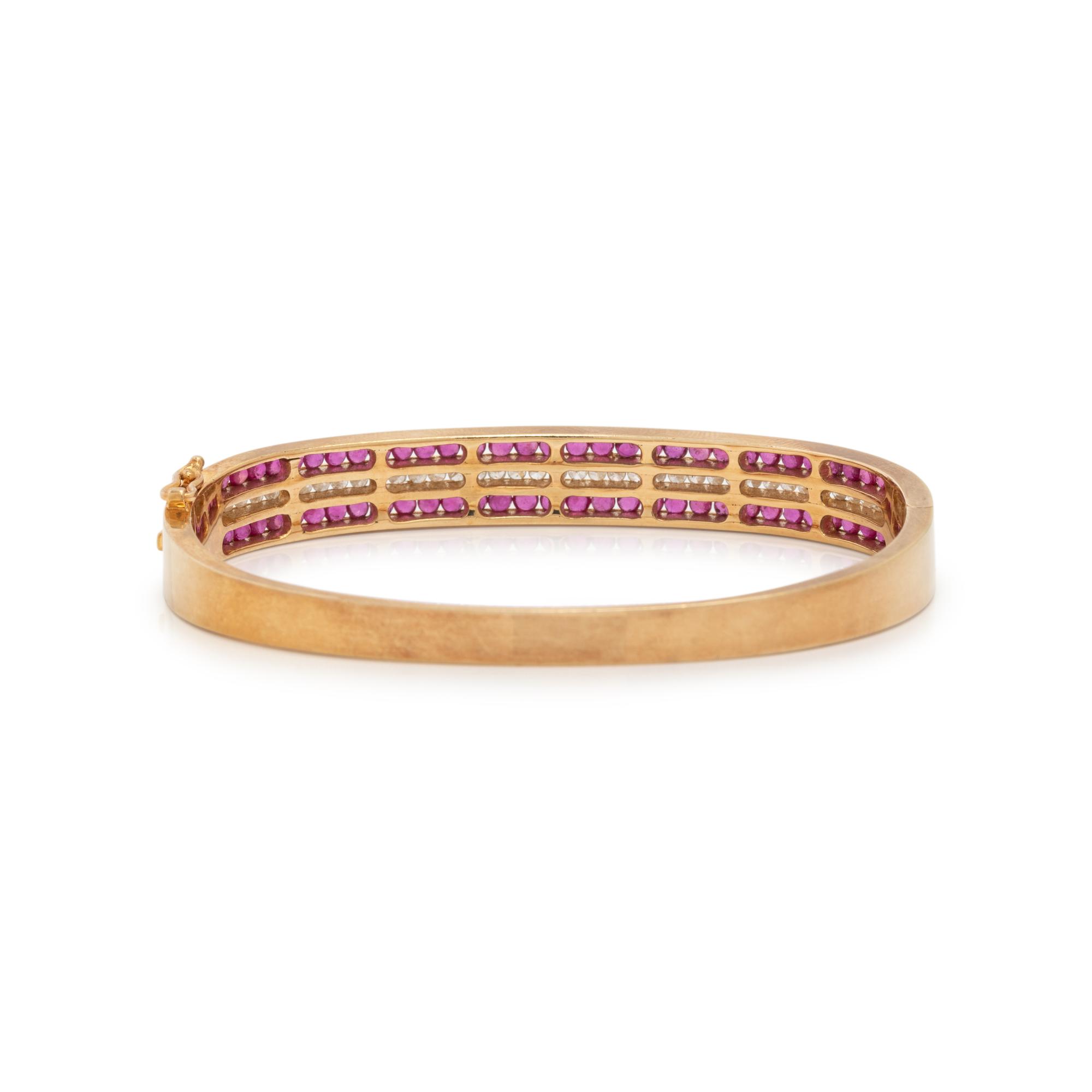 YELLOW GOLD, RUBY AND DIAMOND BANGLE BRACELET
