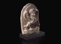 A carved grey-brown stone stele of Garuda, probably Nepalese 棕灰石雕迦樓羅 或尼泊爾