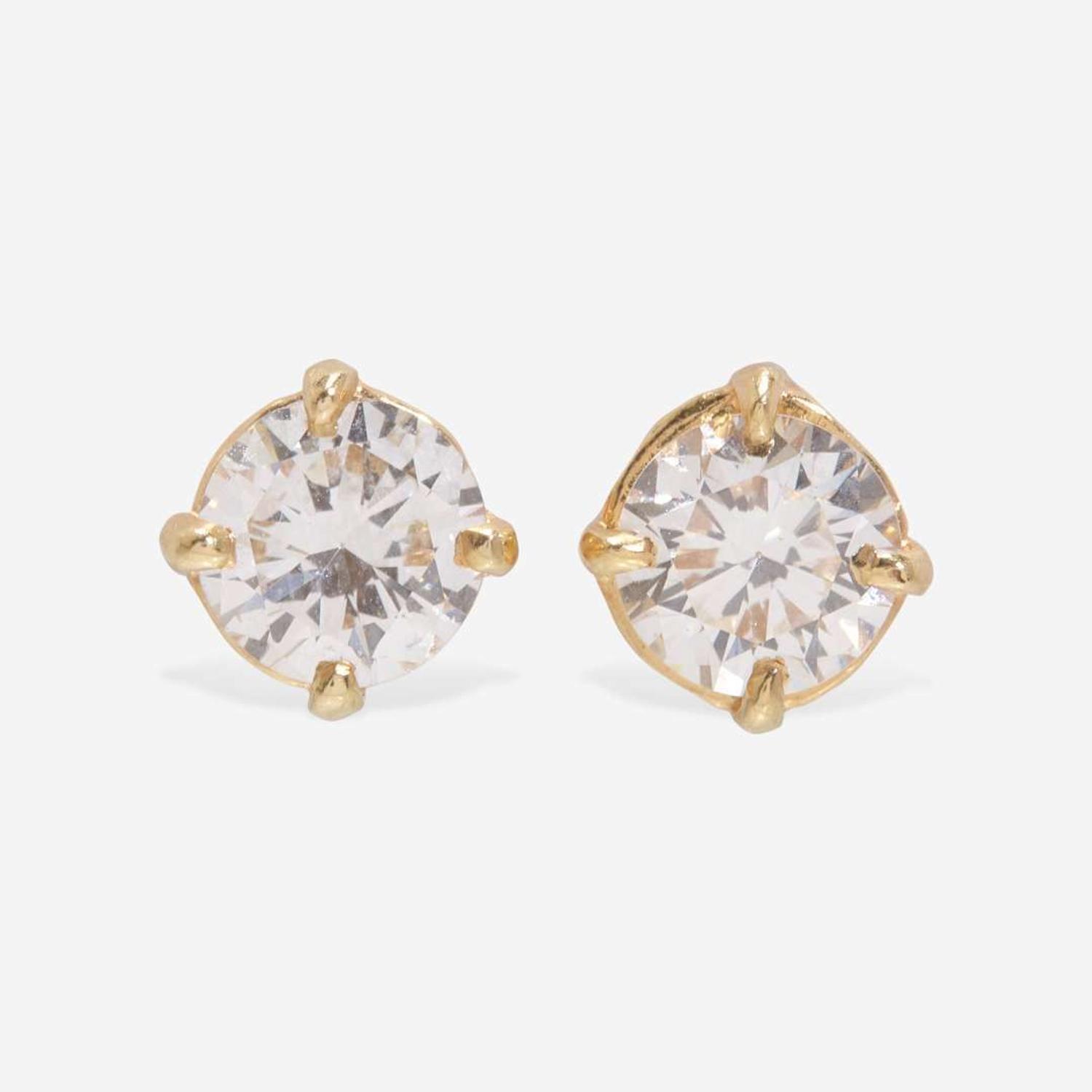 A Pair of 14K Yellow Gold Diamond Studs