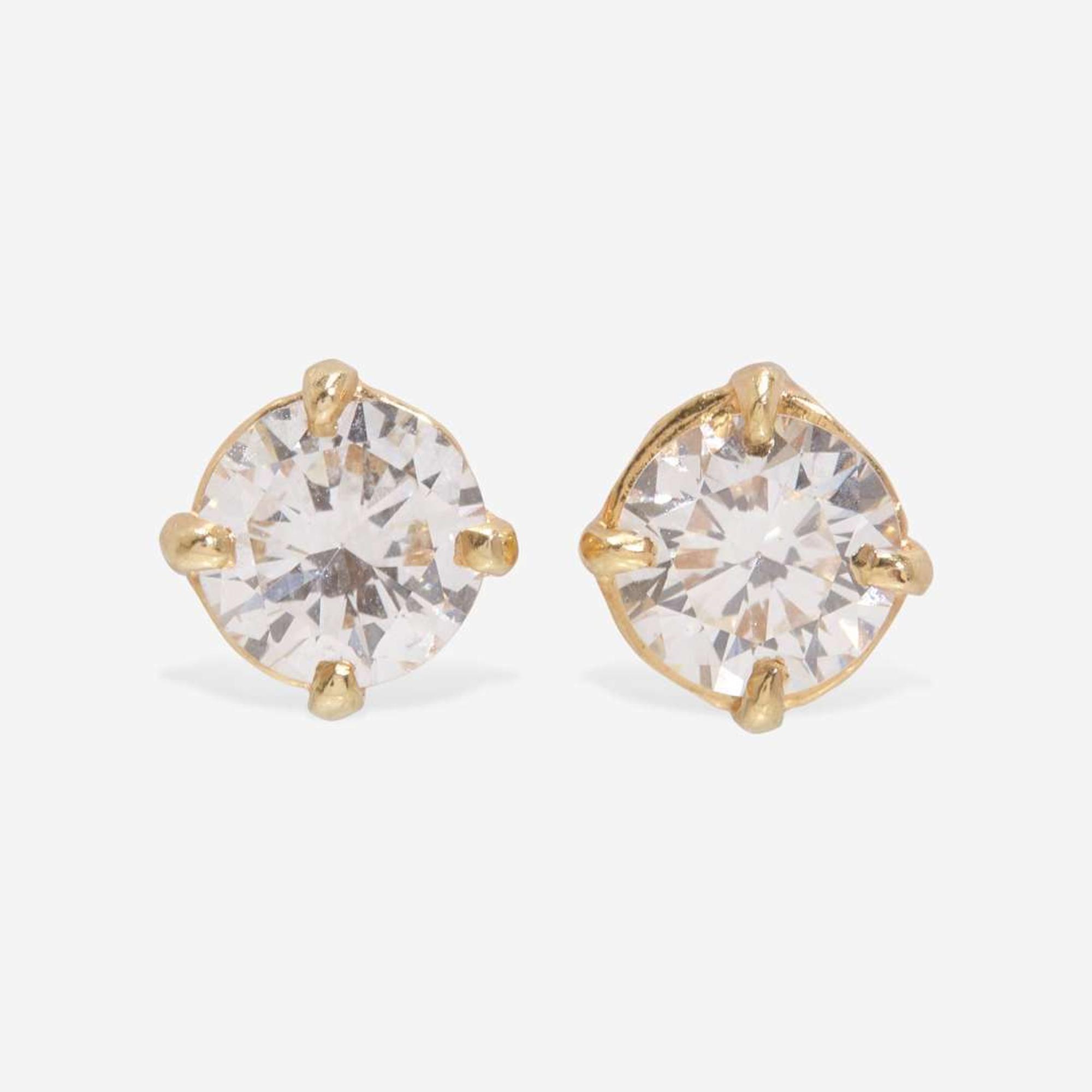 A Pair of 14K Yellow Gold Diamond Studs